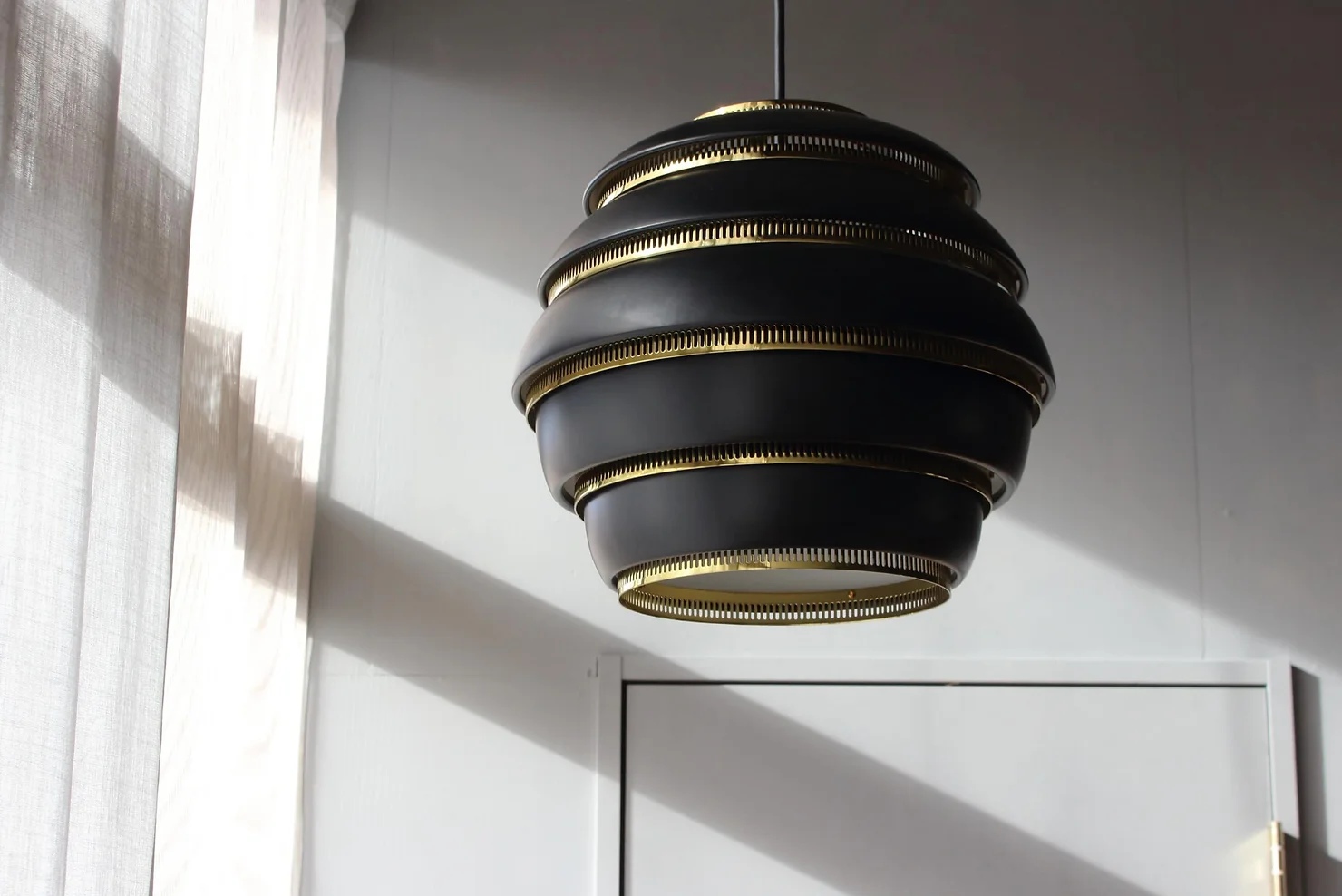 Black beehive pendant detail scene