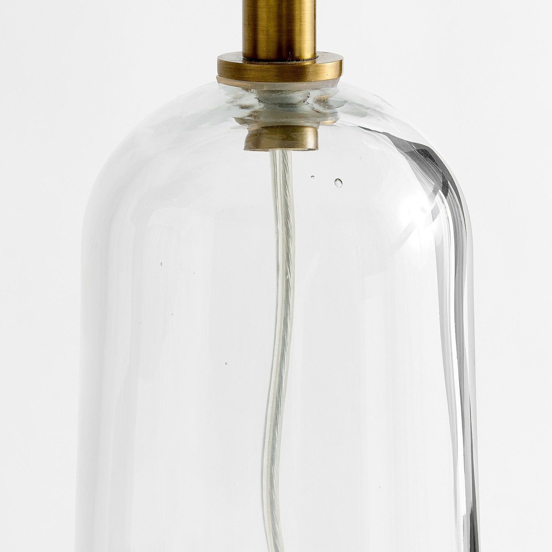 Clear glass base with brass hardware