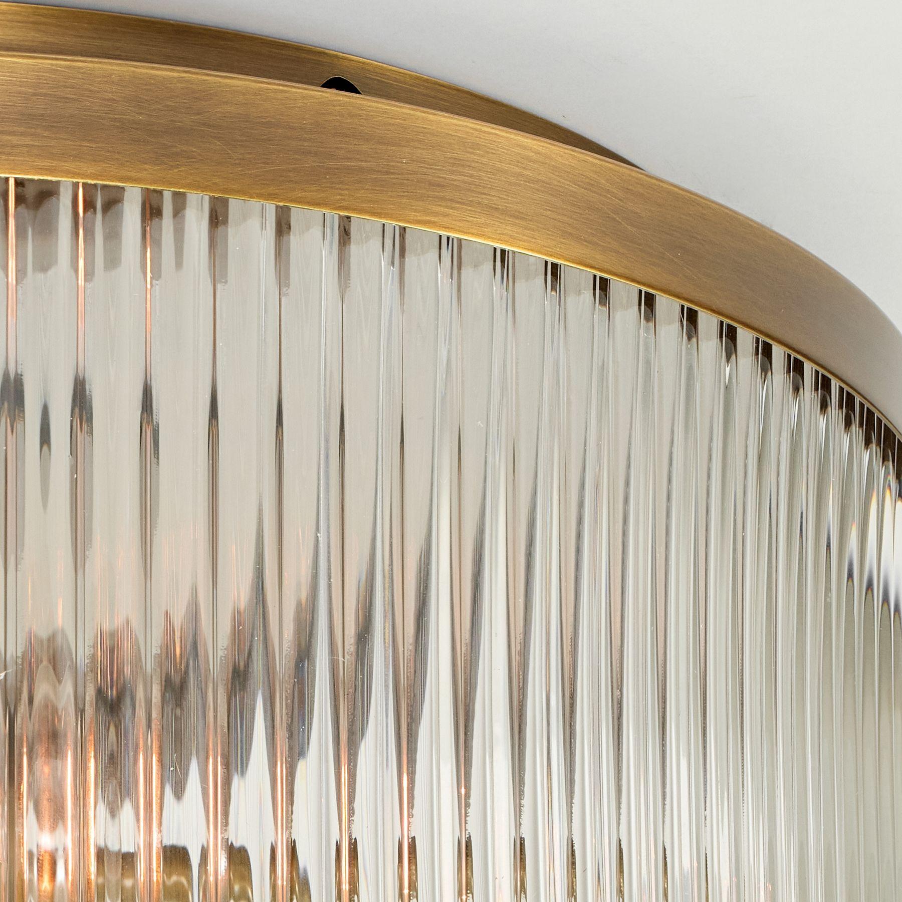 Ribbed glass shade creates a rainbow-like effect