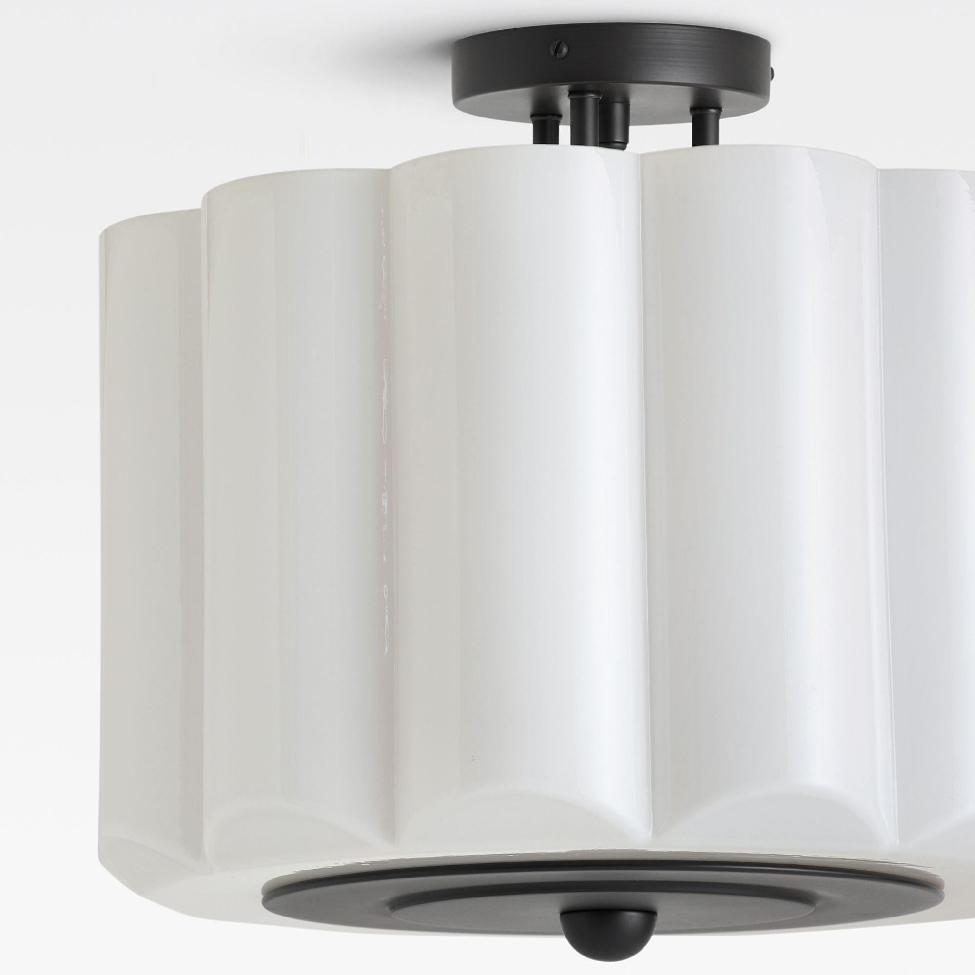 White fan-shaped glass lampshade