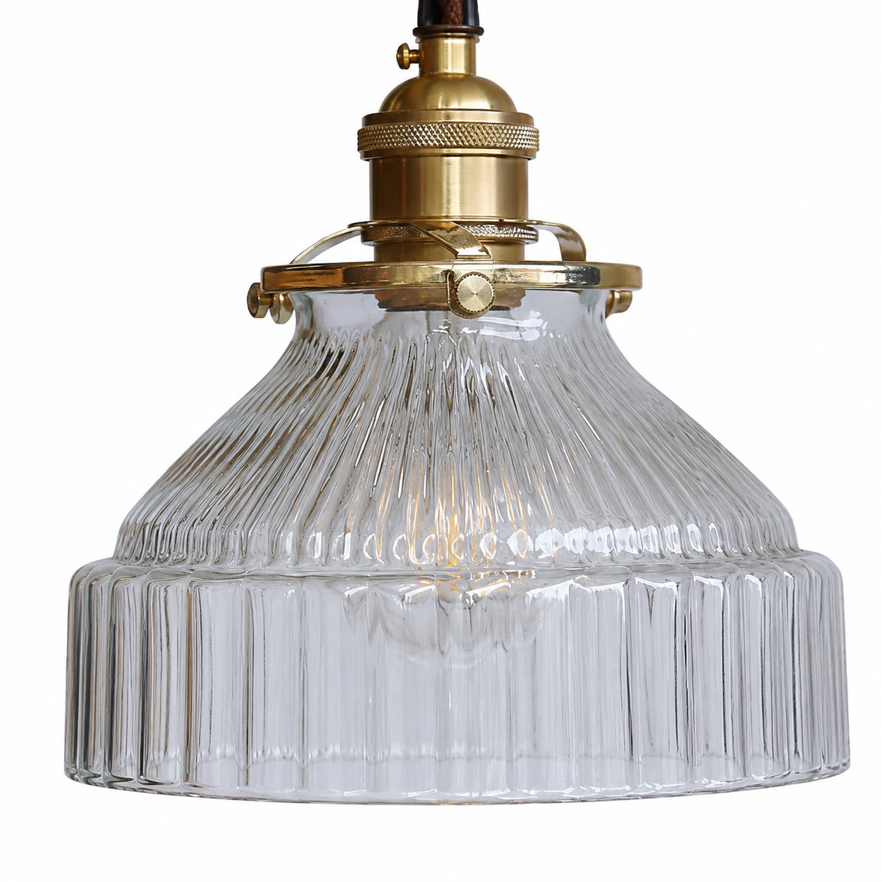 Close detail of brass finish and glass pendant structure