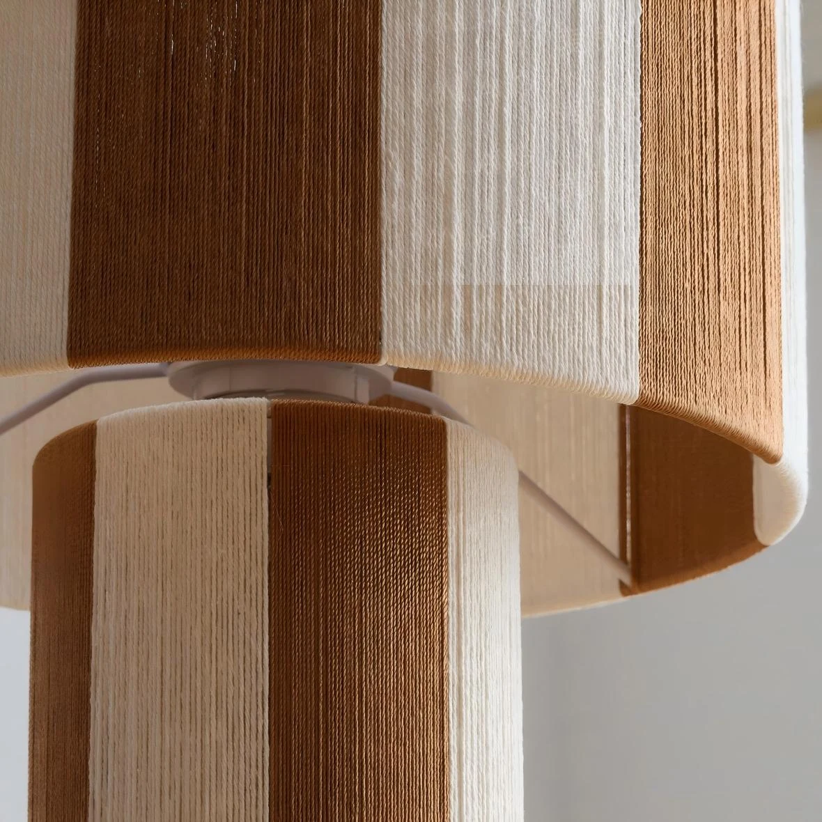 Close detail of striped woven lamp shade panels