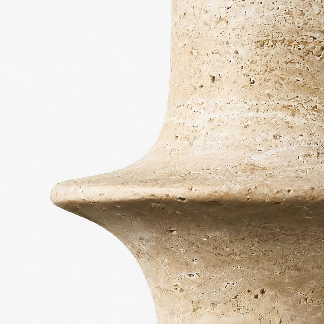 Close detail of polished travertine rim with natural pores