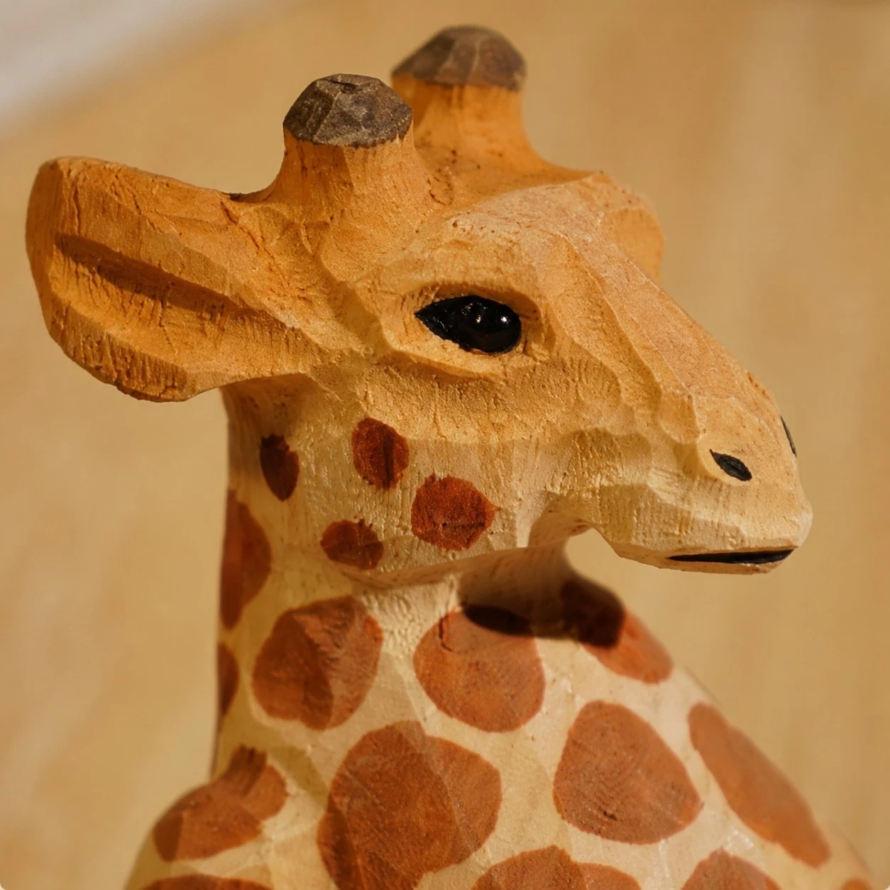 Hand-painted giraffe head detail