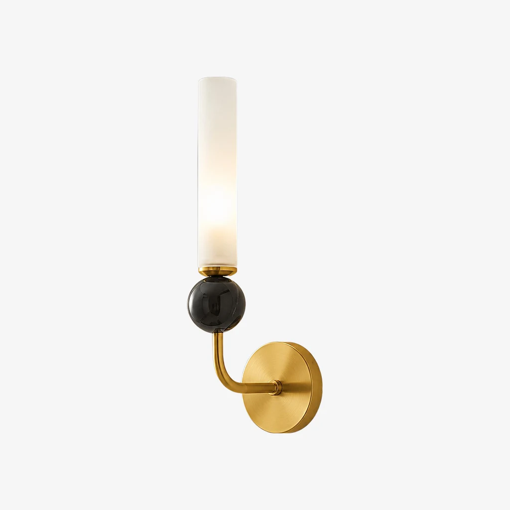 A small brass wall sconce