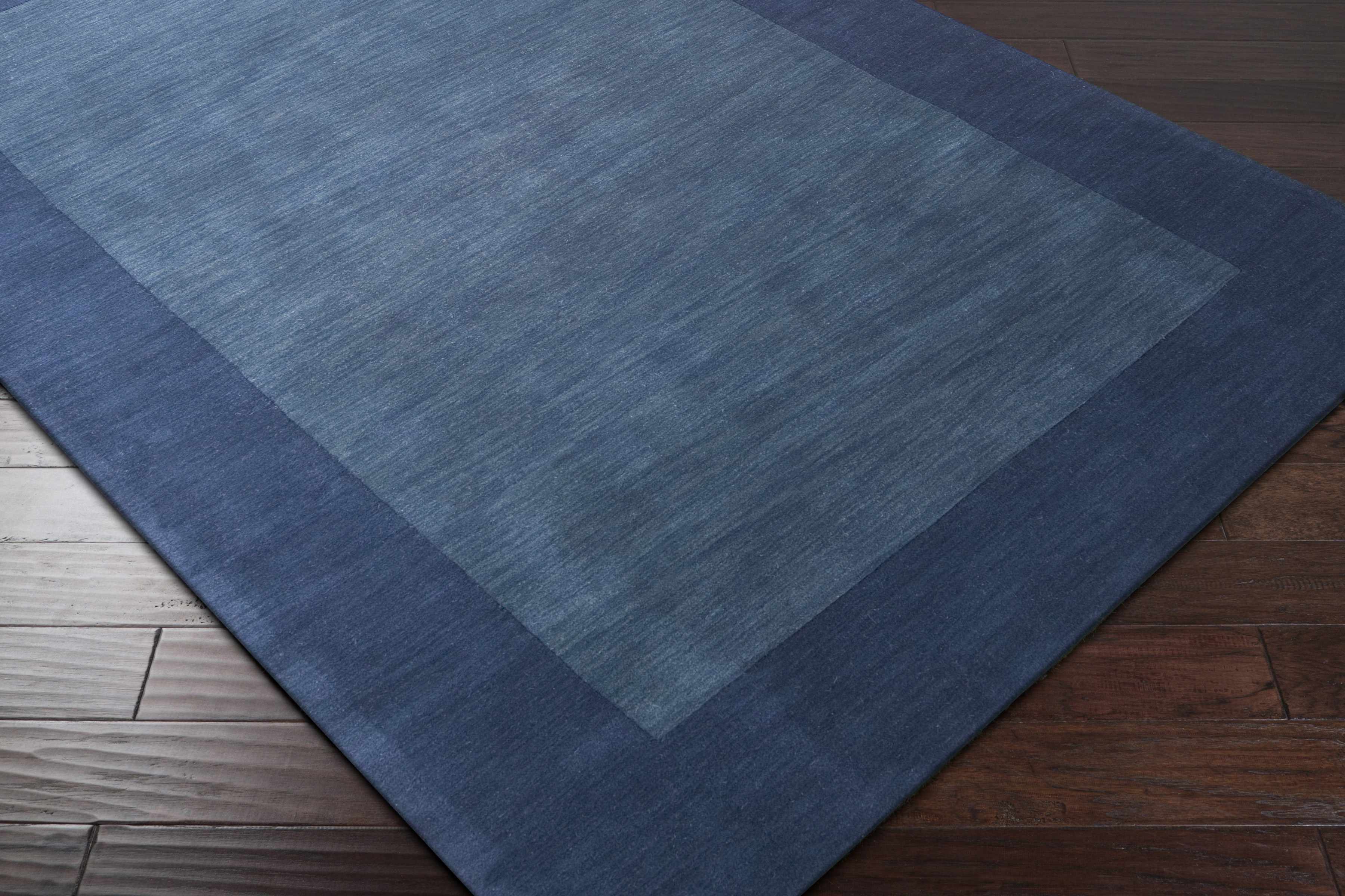 Fingerhut Wollteppich mit blauem Rand