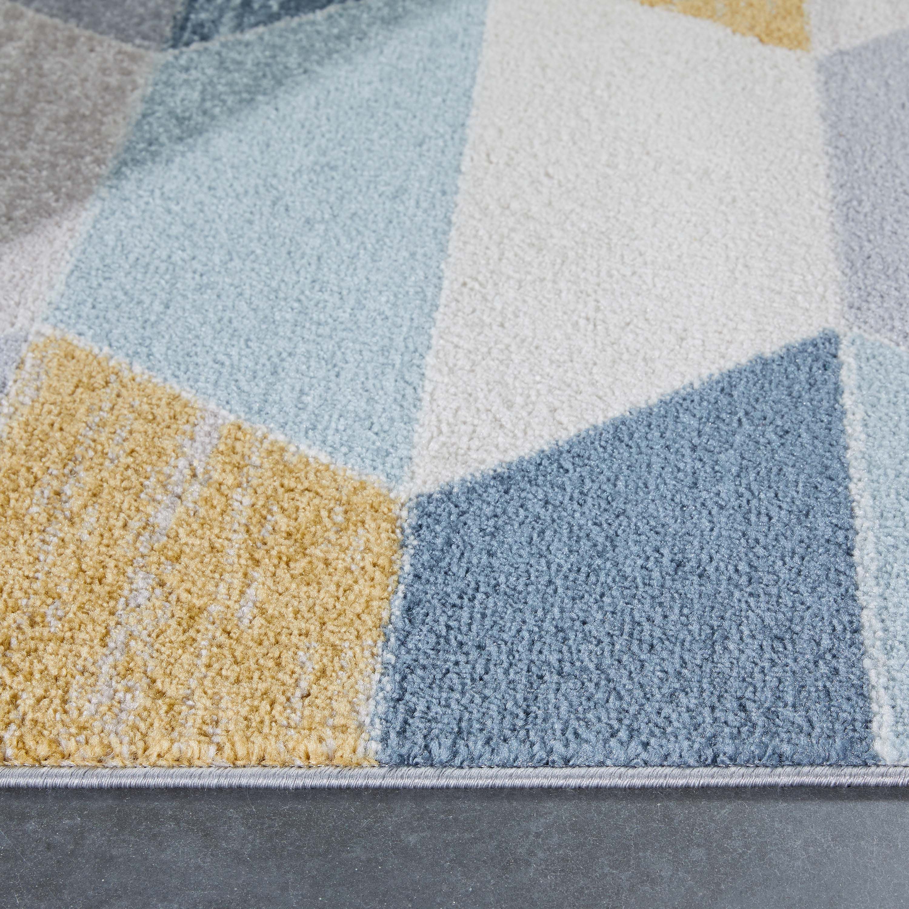 Moderner geometrischer Maddox-Teppich in Blau