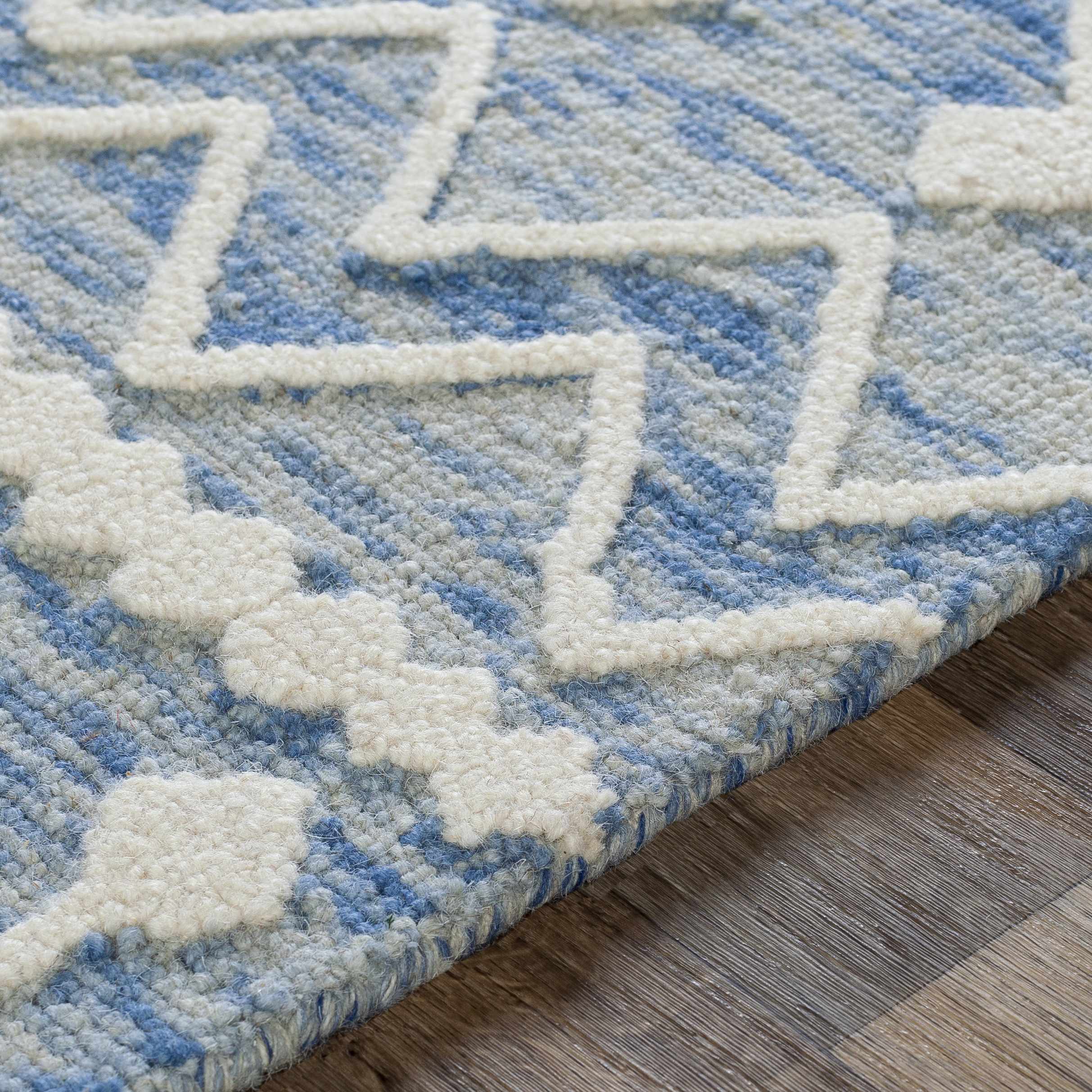 Blauer Plainwell-Wollteppich mit Pr&auml;gung &ndash; Ausverkauf