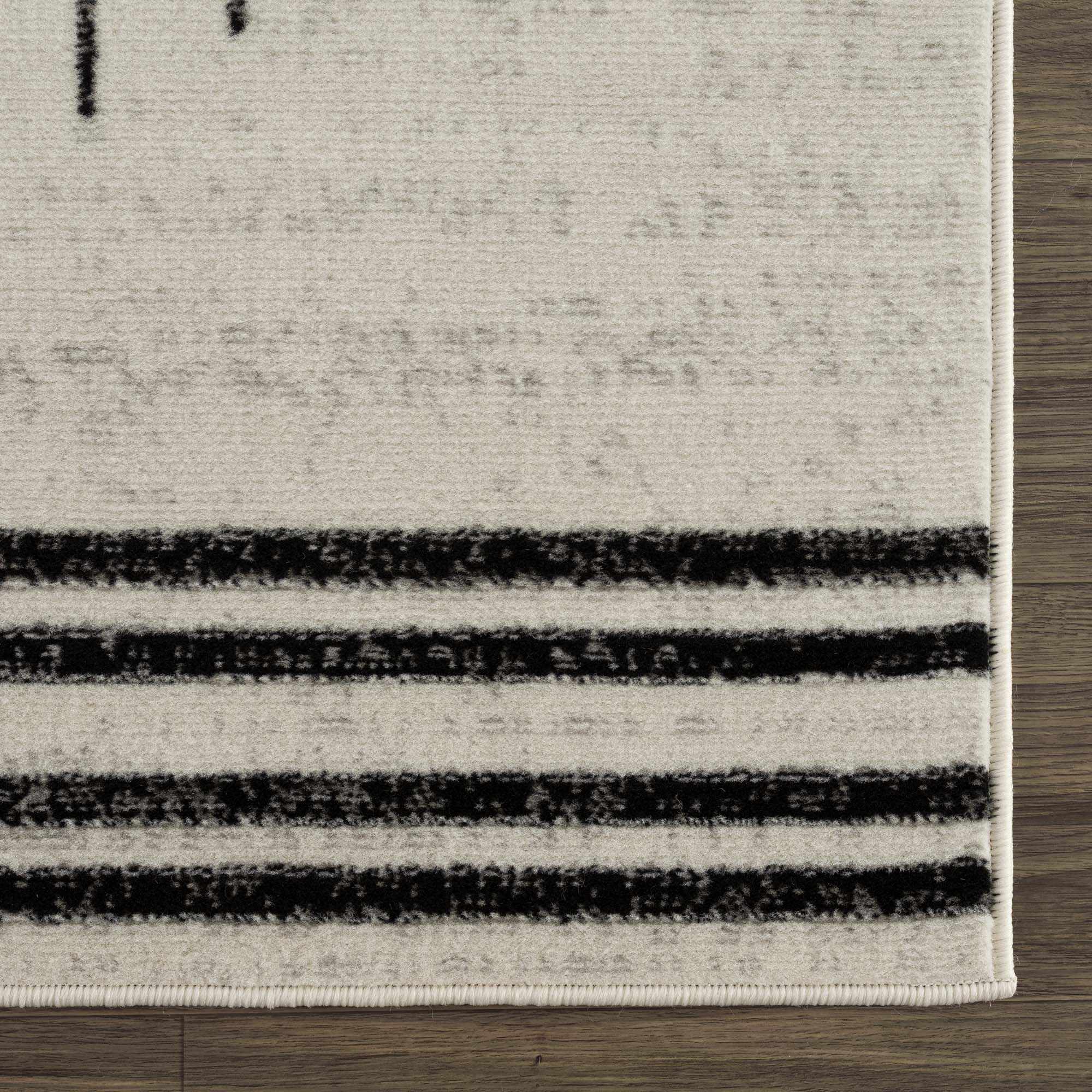 Schwarz-wei&szlig;er geometrischer Angus-Teppich