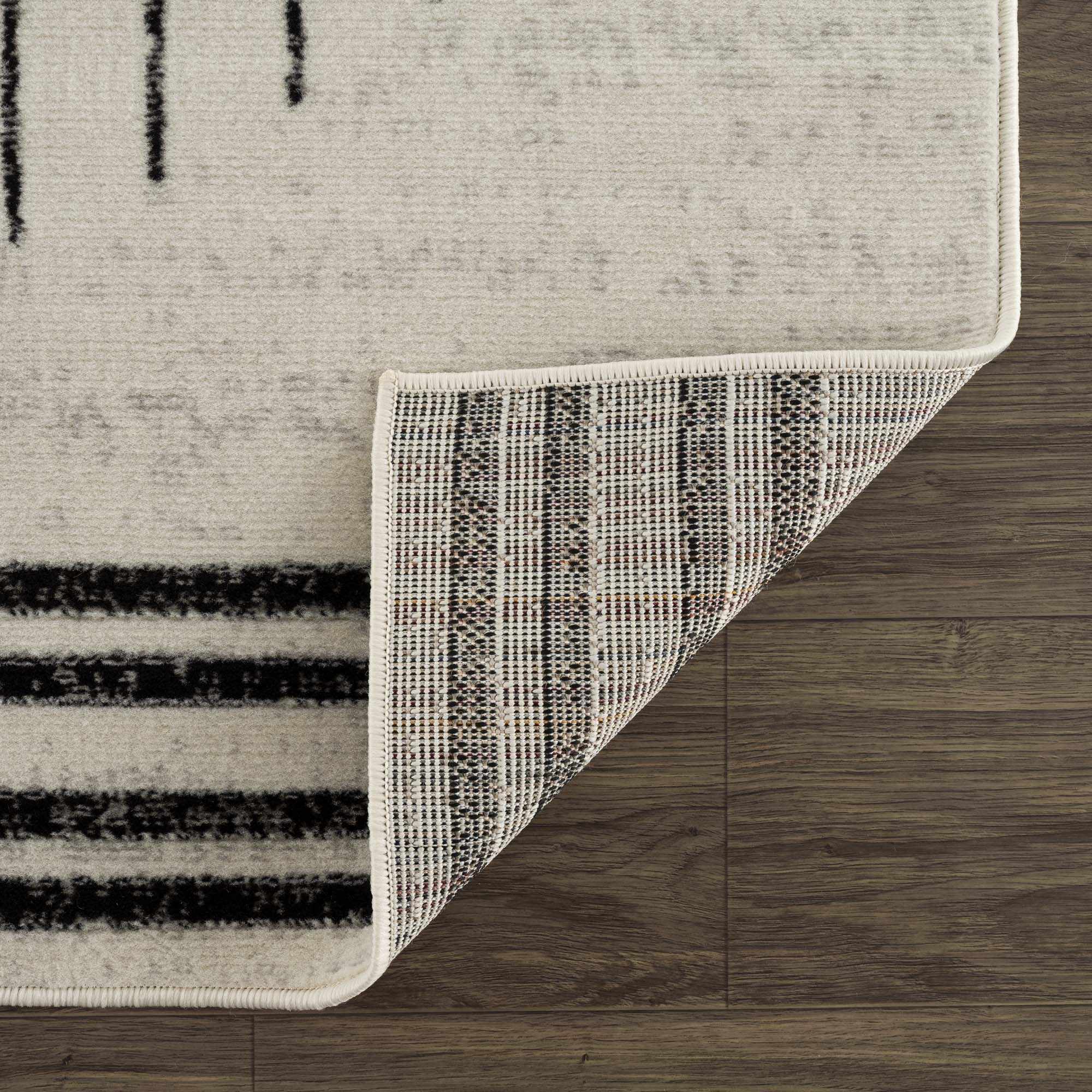 Schwarz-wei&szlig;er geometrischer Angus-Teppich