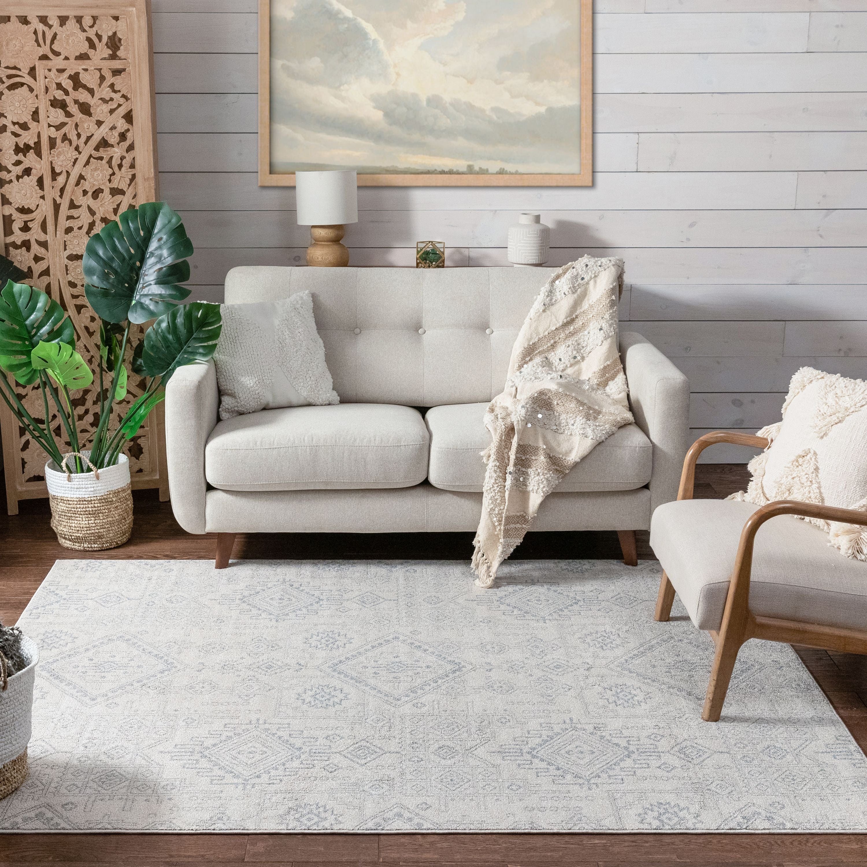 Molly Cremefarbener moderner Ikat-Stammesteppich