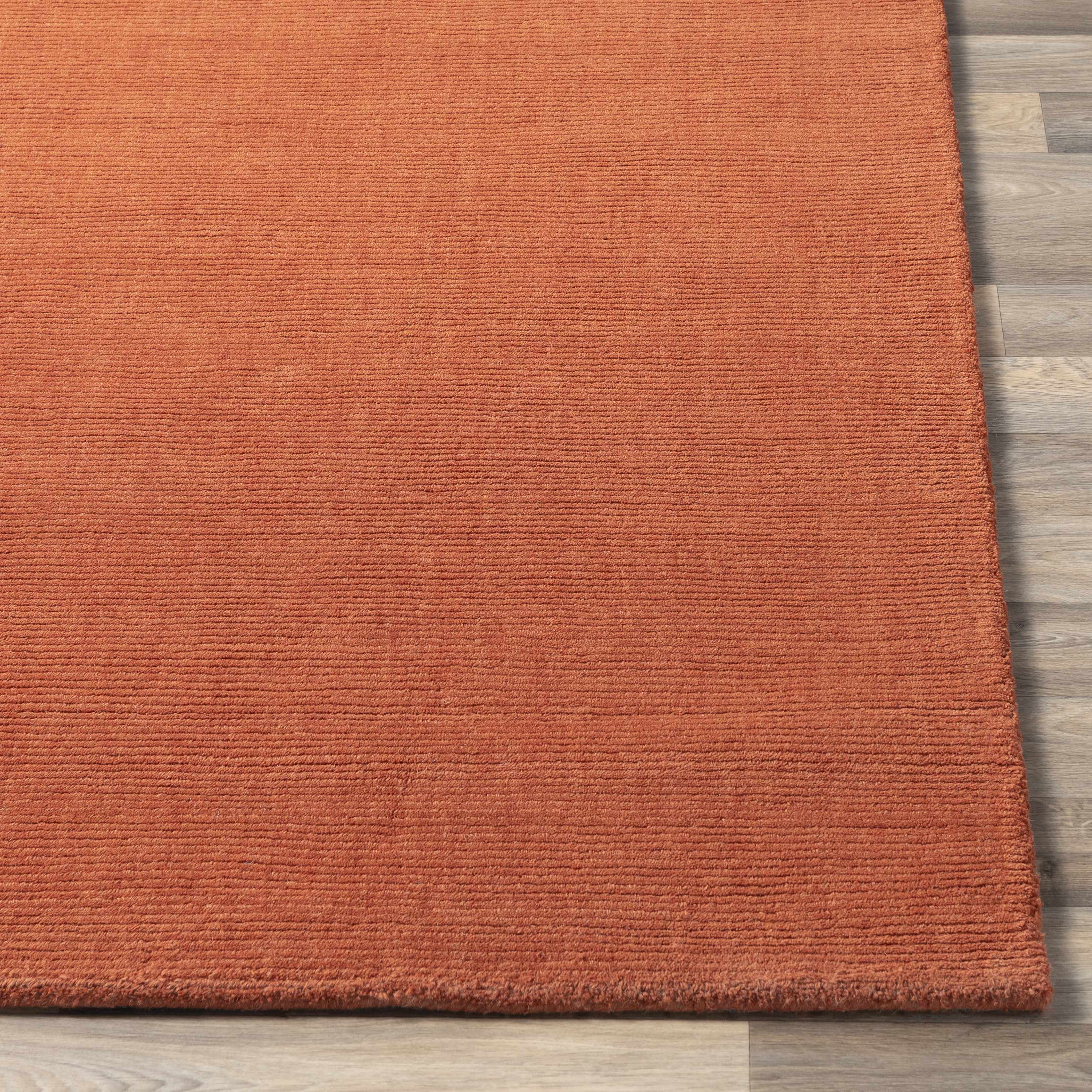 Teppich Brockton aus massiver Wolle in Orange