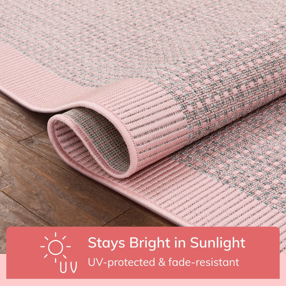 Odin Flachgewebe-Teppich mit fester und gestreifter Bord&uuml;re f&uuml;r den Innen- und Au&szlig;enbereich in Blush