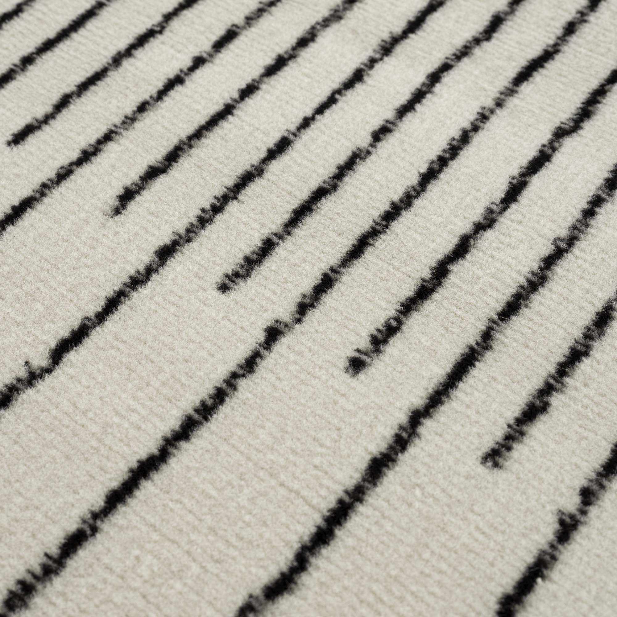 Schwarz-wei&szlig;er geometrischer Angus-Teppich