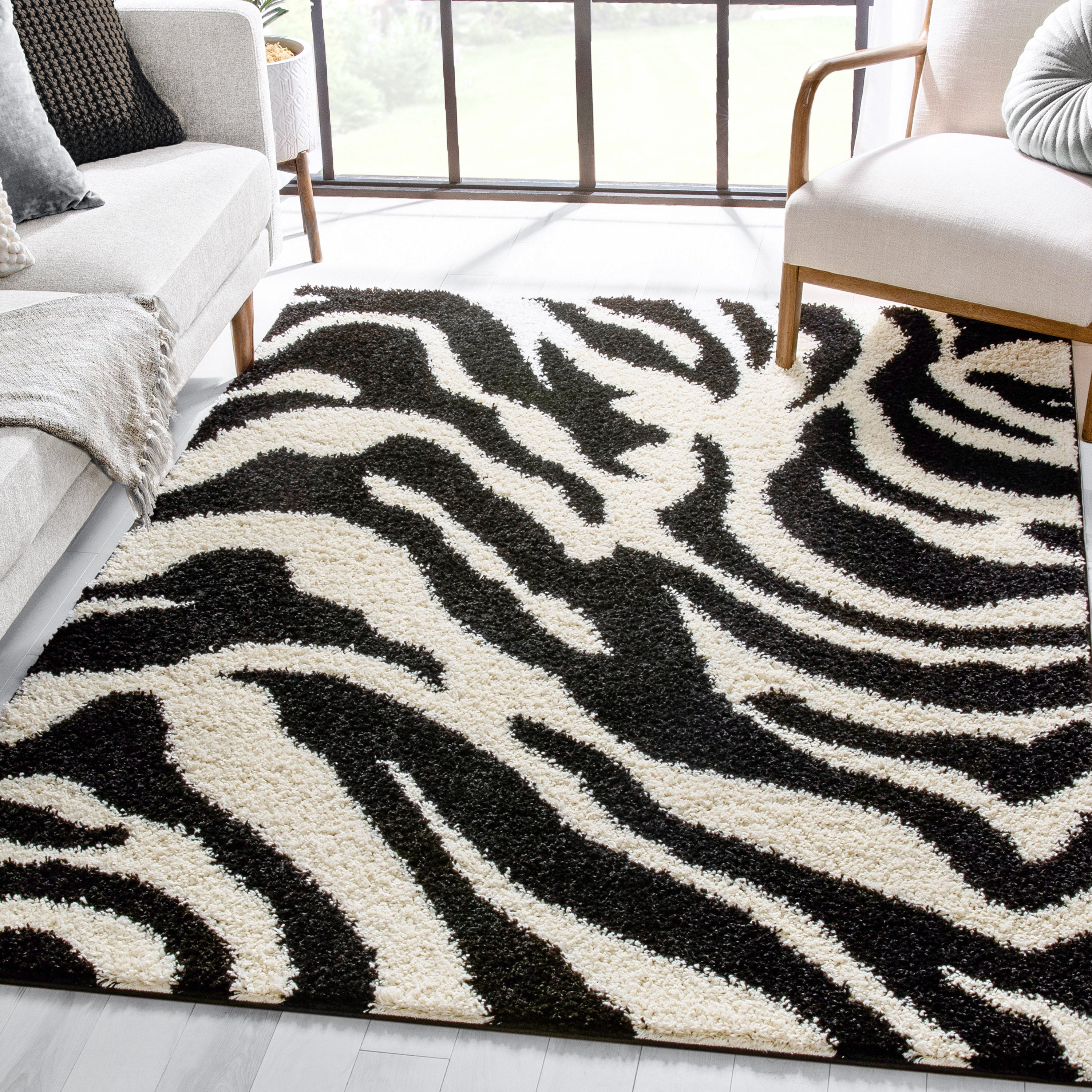 Moderner Shag-Teppich in Safari-Zebra-Optik in Schwarz