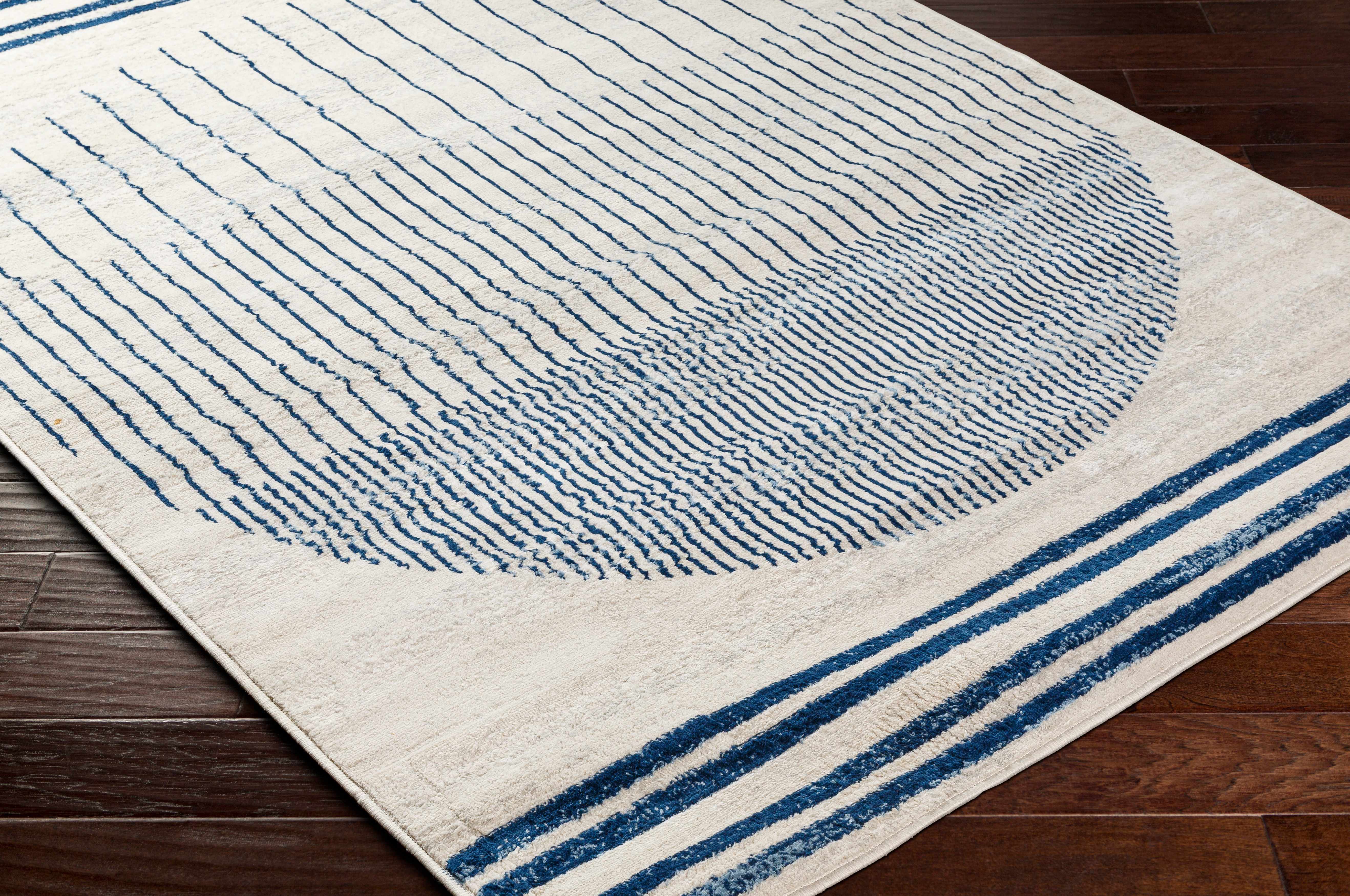Geometrischer Angus-Teppich in Blau und Wei&szlig;