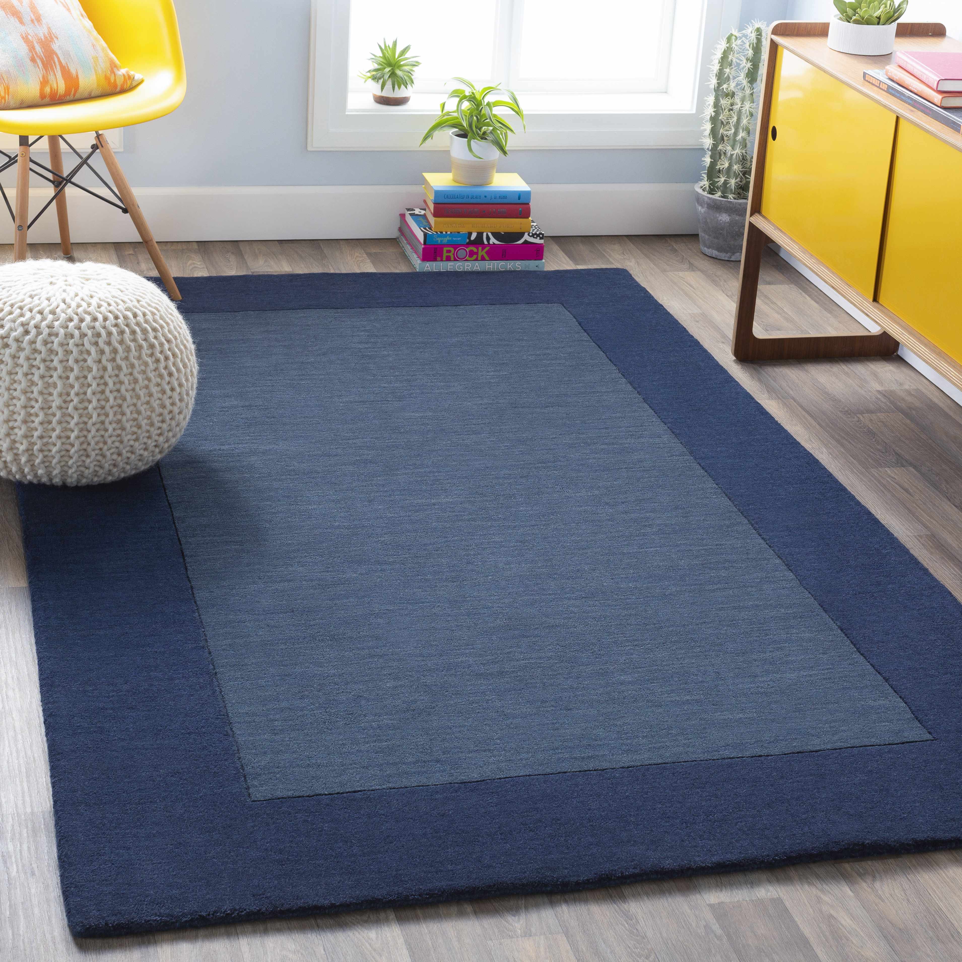 Fingerhut Wollteppich mit blauem Rand