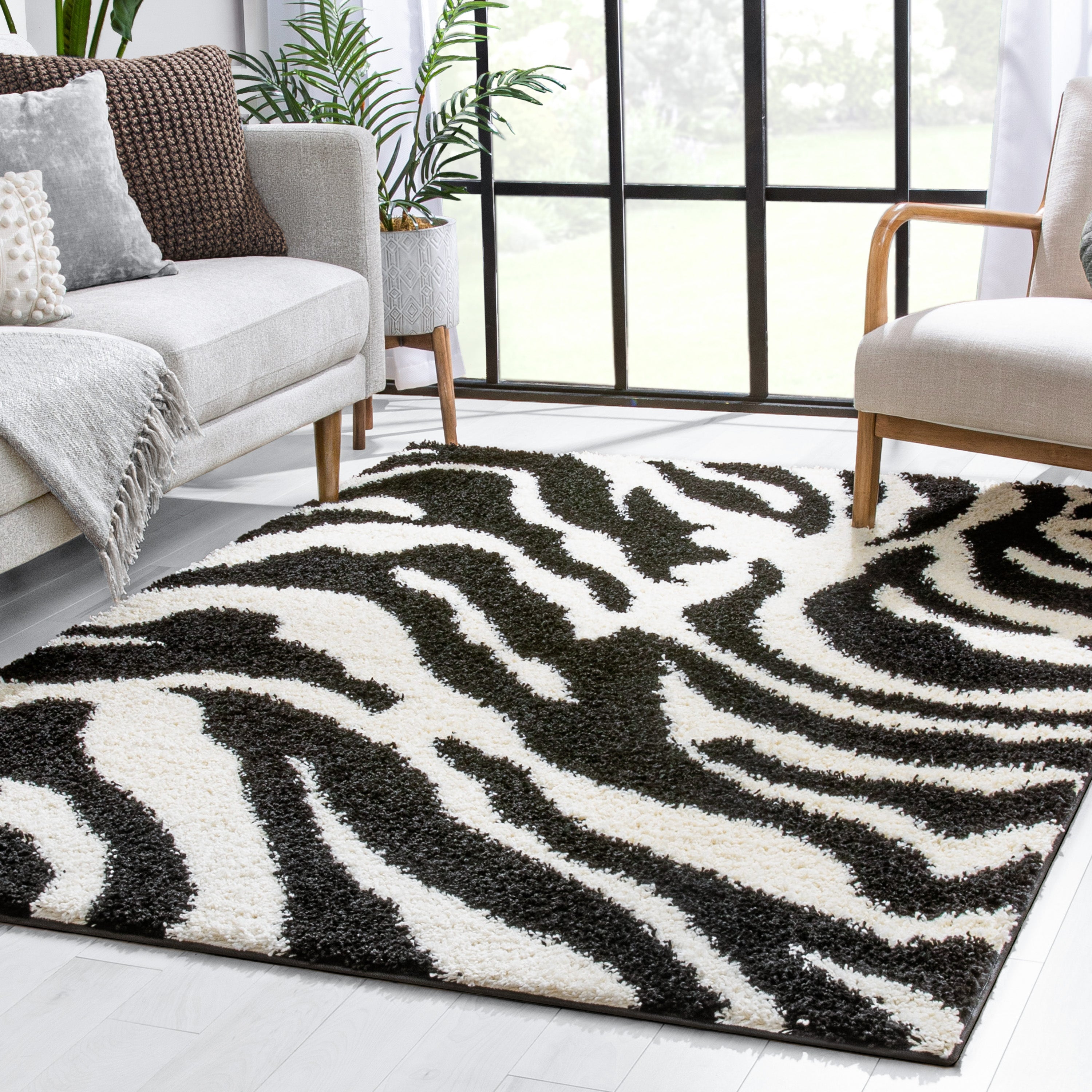 Moderner Shag-Teppich in Safari-Zebra-Optik in Schwarz