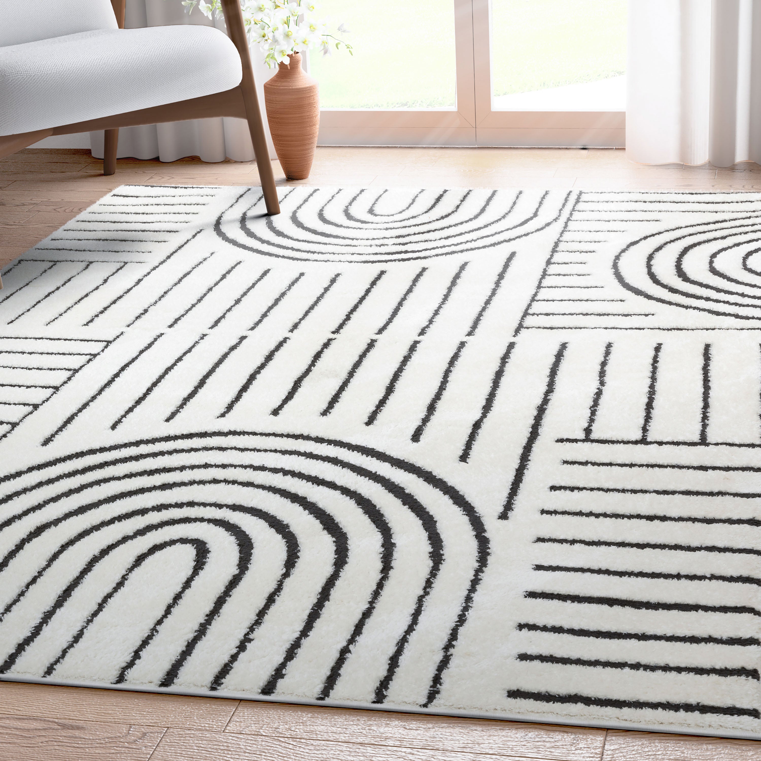 Boho-Rainbow-Teppich in Elfenbein und Schwarz mit Bögen und Linien im Hoch-Tief-Flor