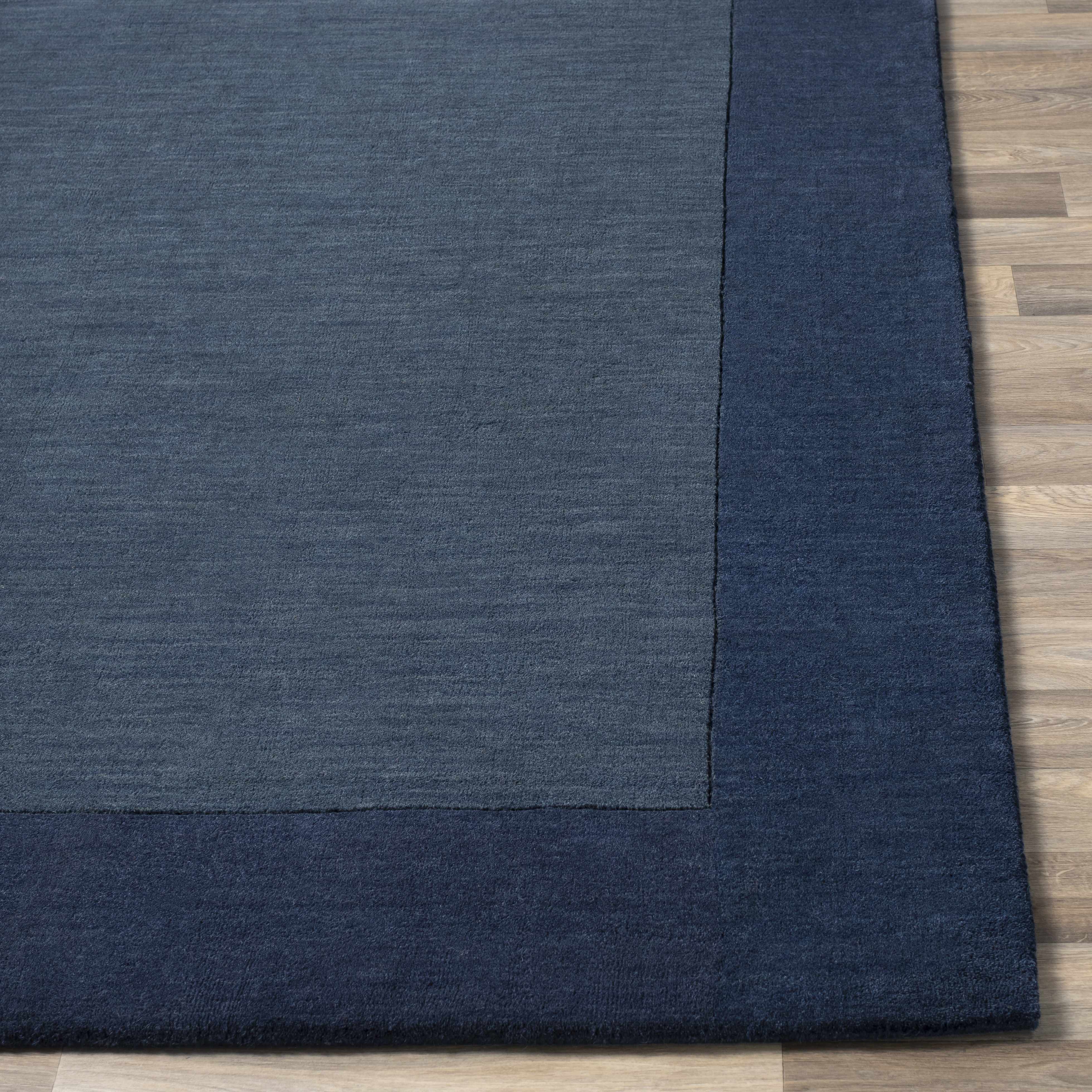 Fingerhut Wollteppich mit blauem Rand