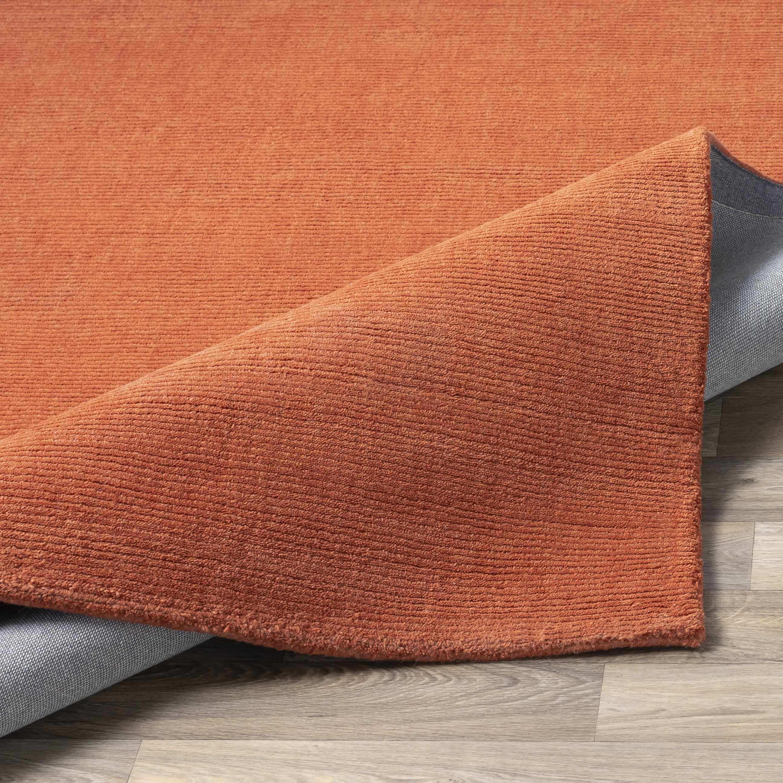 Teppich Brockton aus massiver Wolle in Orange