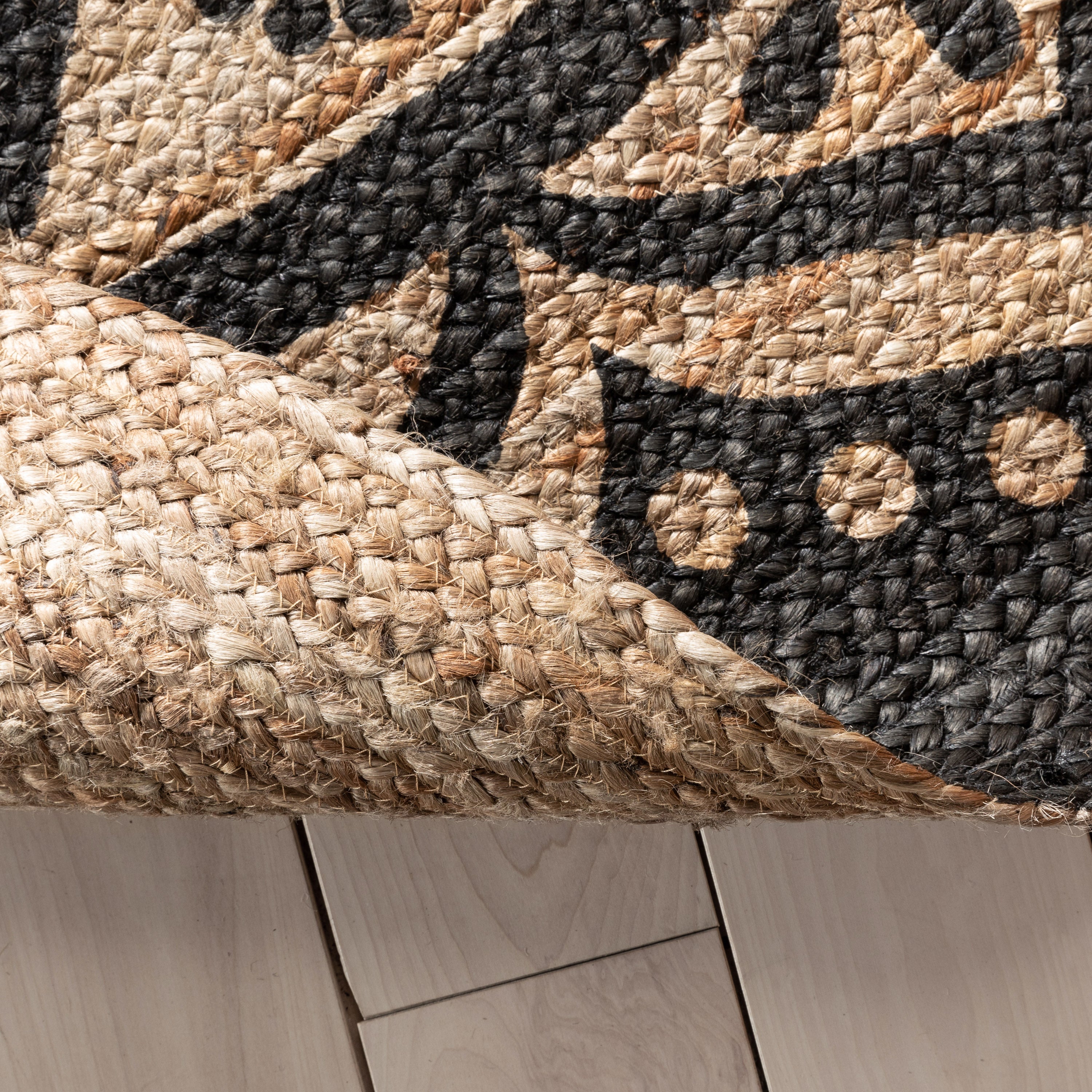 Kiera Bohemian Tribal handgeflochtener schwarzer Jute-Naturteppich