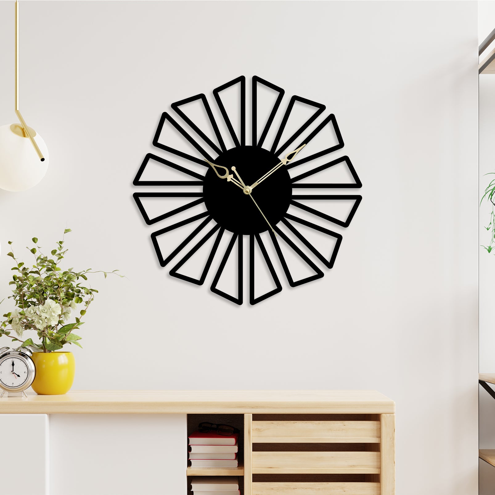 Black metal wall clock with geometric flower petals