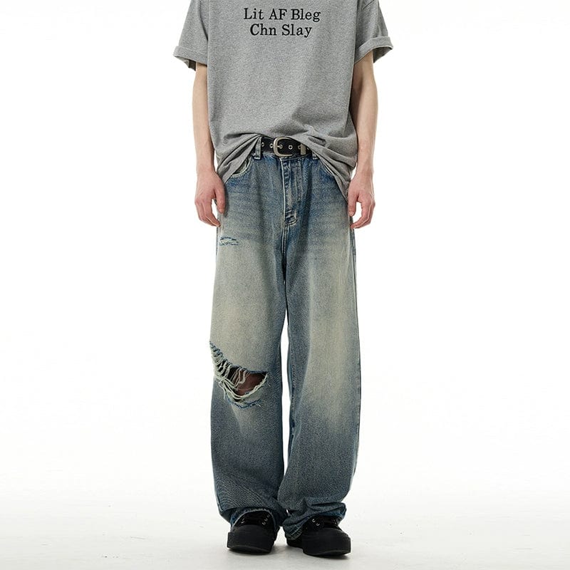 RIPPED BLUE DENIM JEANS