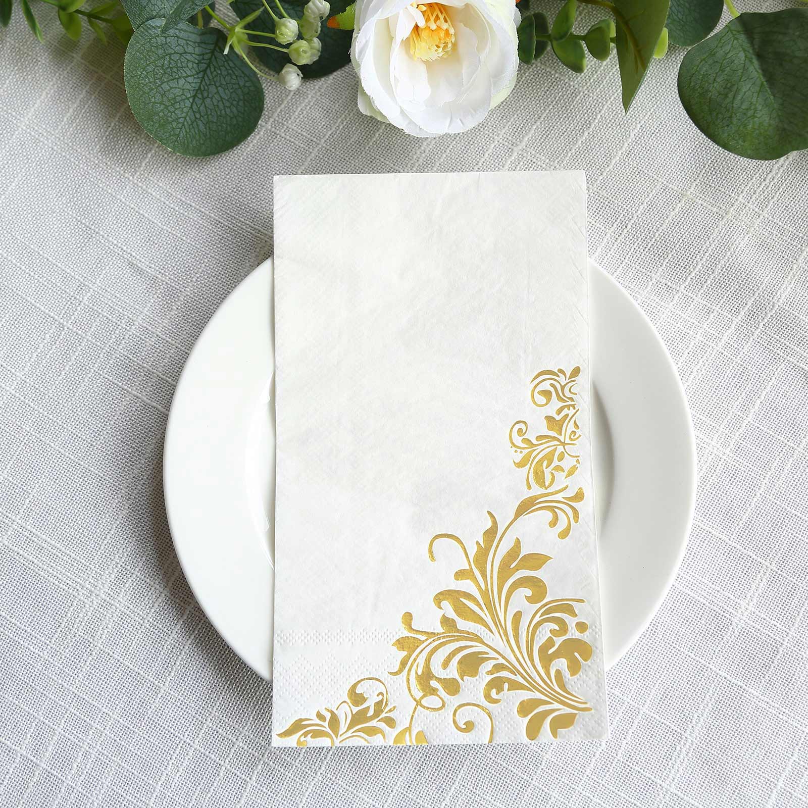 White disposable paper napkins with gold baroque floral print