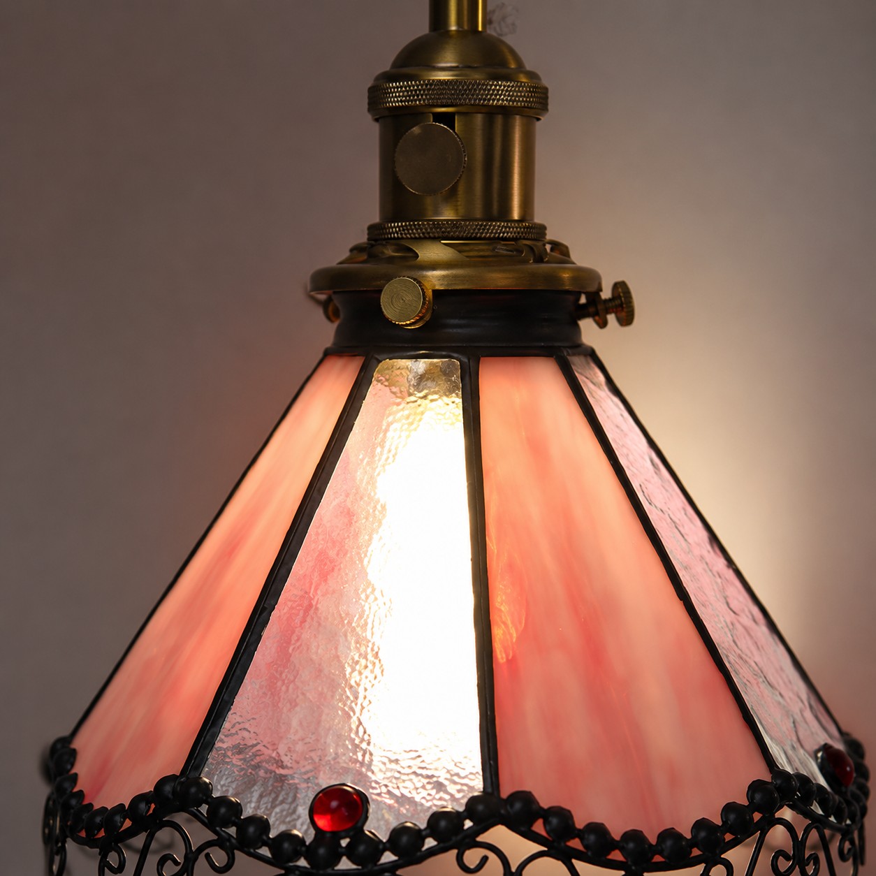 Pink stained glass shade lit detail