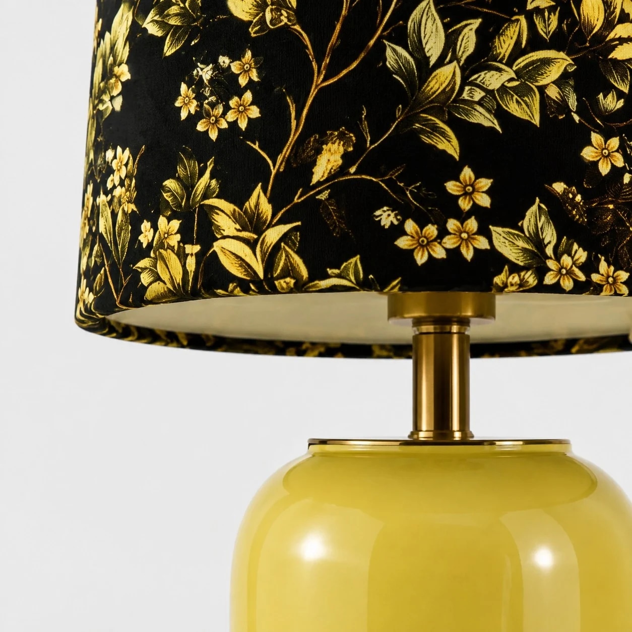 Floral shade fabric and warm metal neck detail