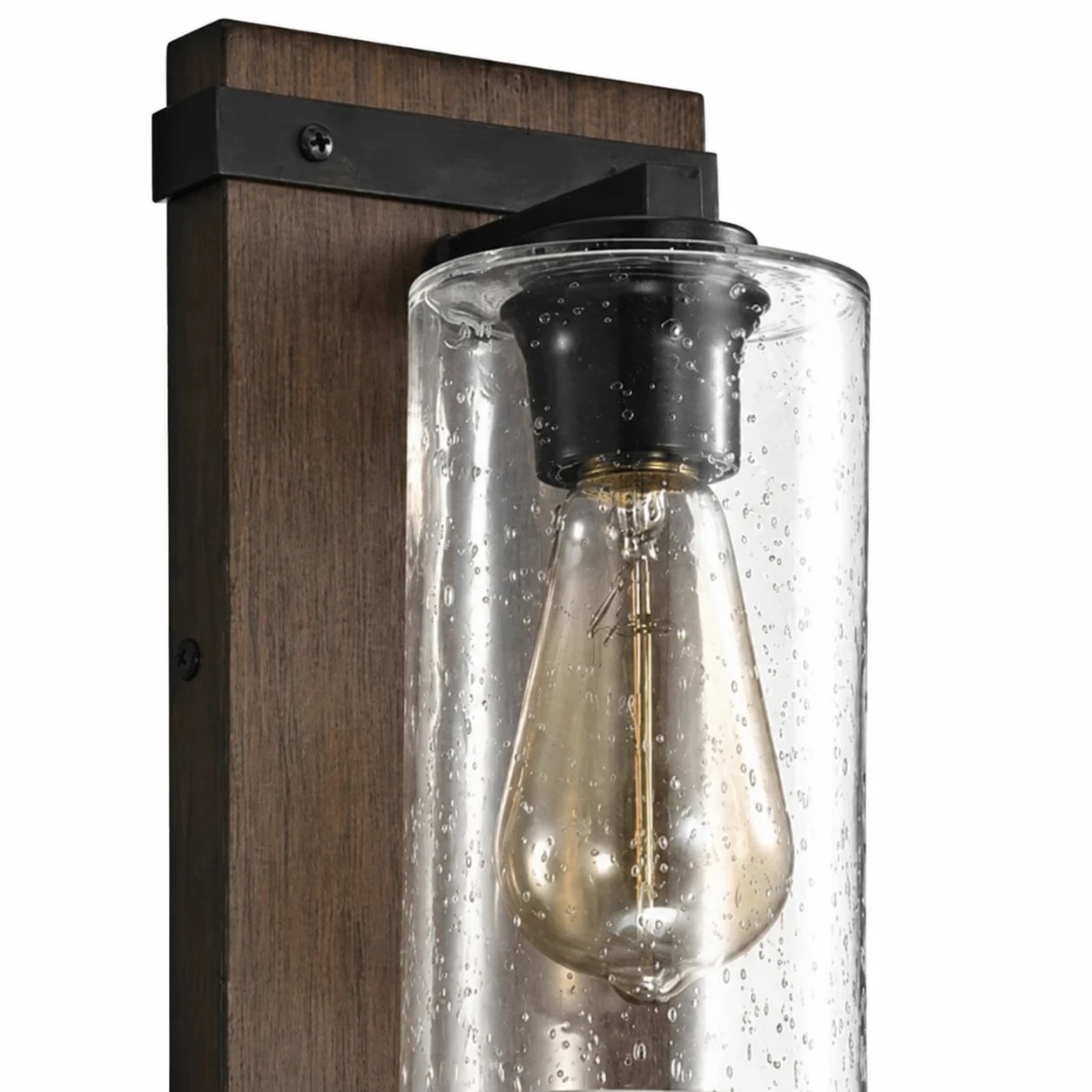 Close detail of seeded clear glass shade and visible bulb