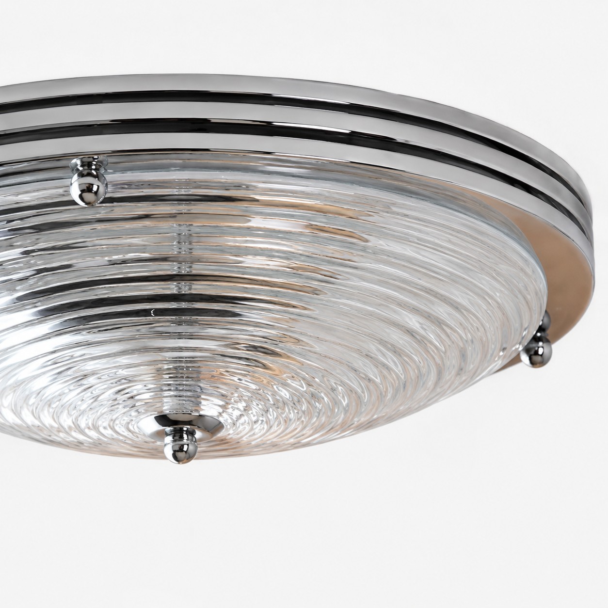 Chrome plated round ceiling light detail