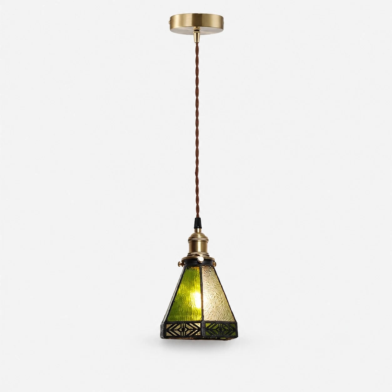 Full view of green stained glass pendant light with cord and canopy
