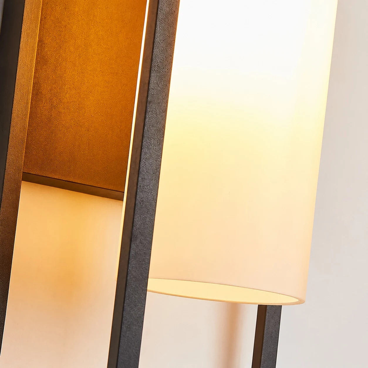 Warm light through white glass shade detail