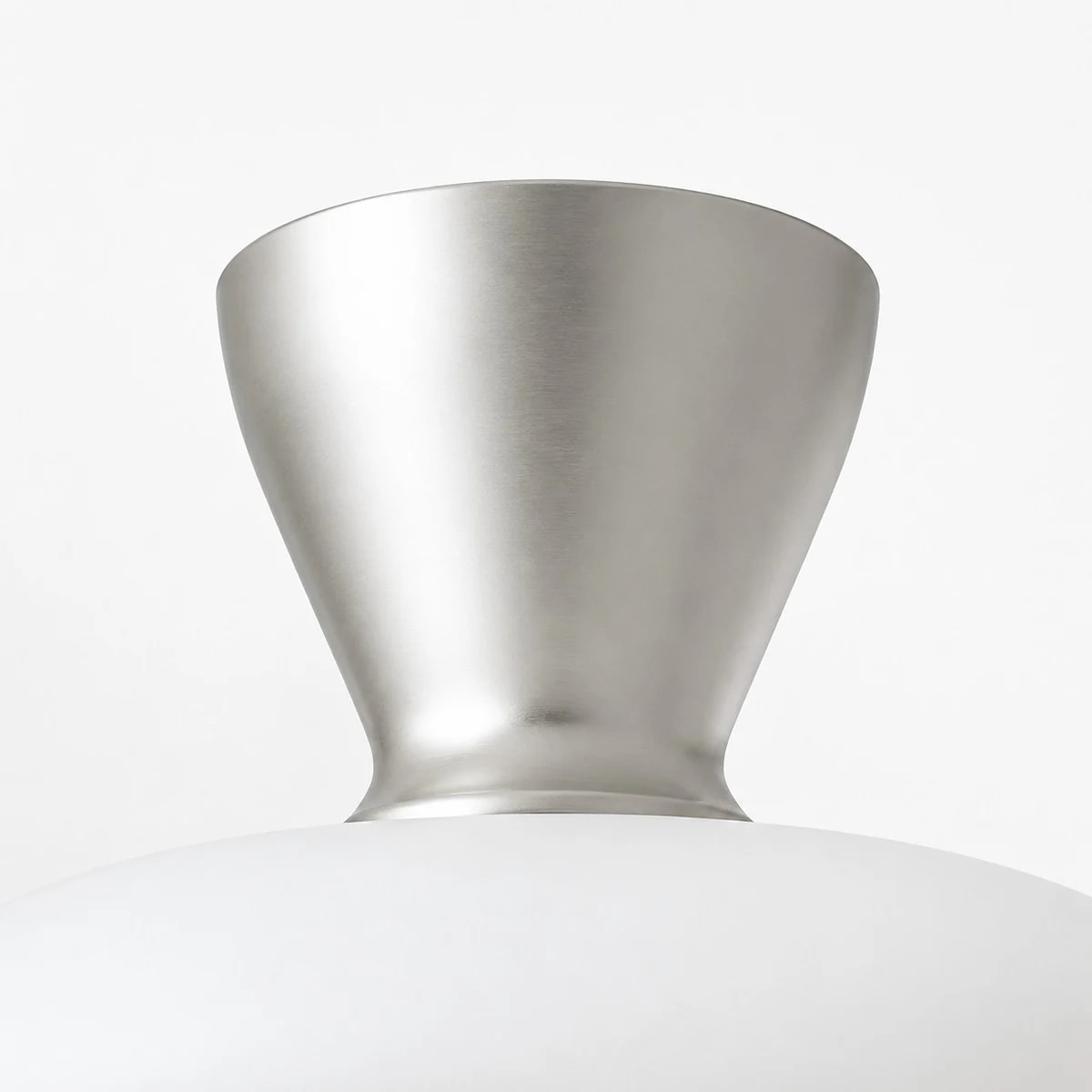 Silver metal canopy and white glass shade detail on Konos ceiling light