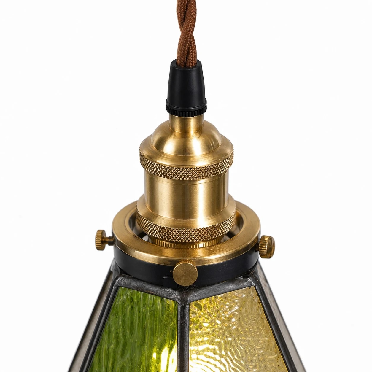 Brass-tone pendant socket, braided cord, and stained glass shade detail