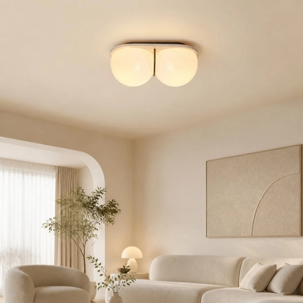 Cream travertine double globe ceiling lamp room scene