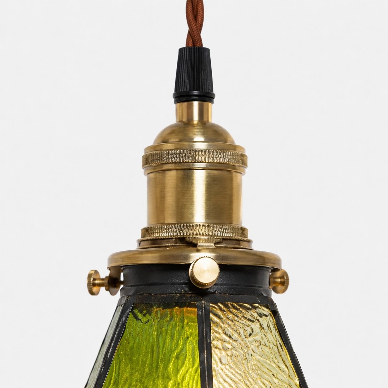 Upper hardware detail on stained glass pendant light