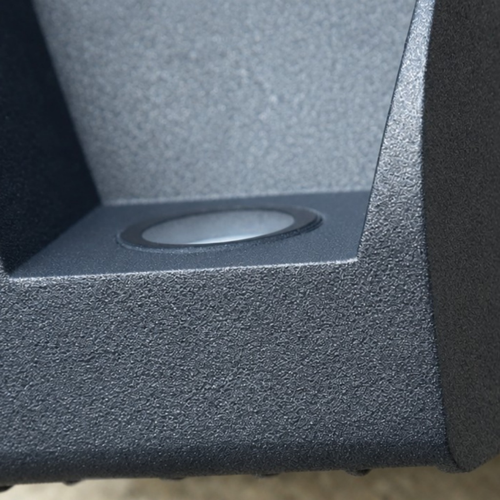 Detail van de lens van een zwarte buitenwandlamp