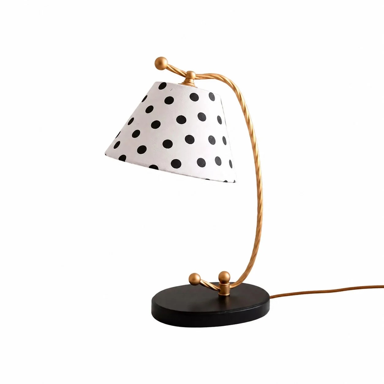 Full view of black and white polka dot table lamp