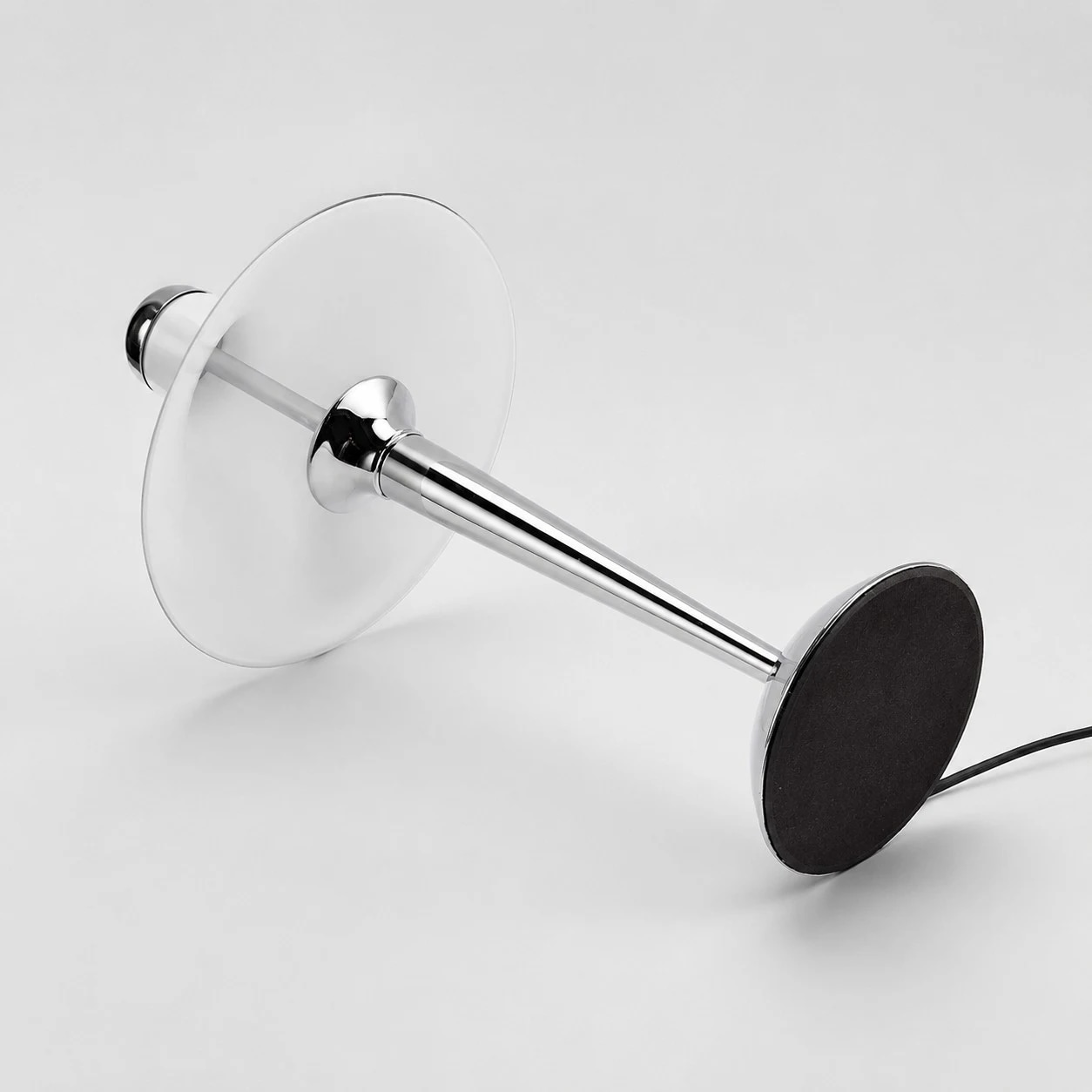 Close view of the chrome base and shade underside