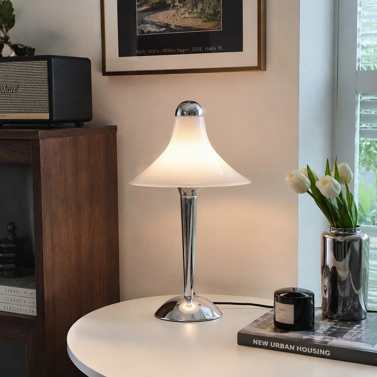 White table lamp styled on a round living room table
