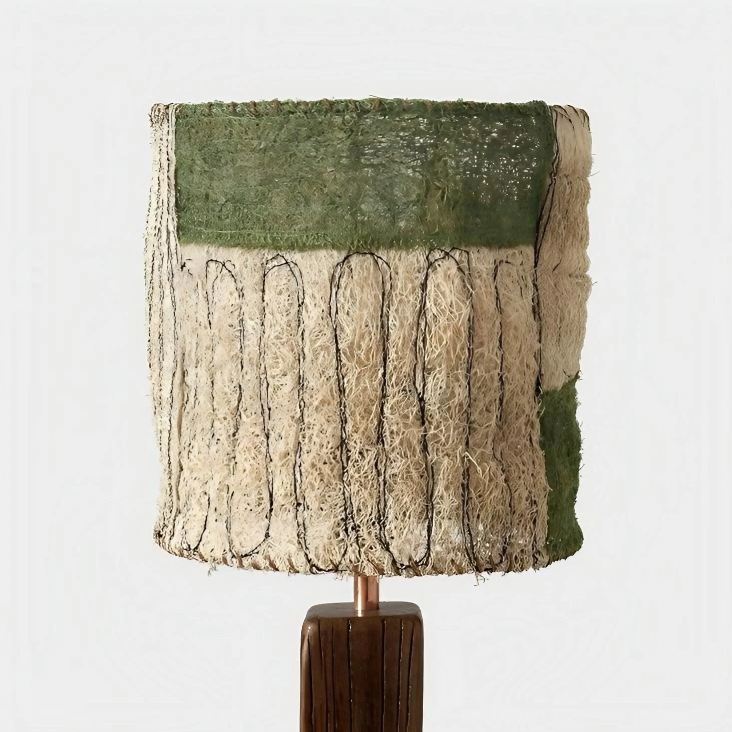 Close view of the green panel loofah shade and woven edge
