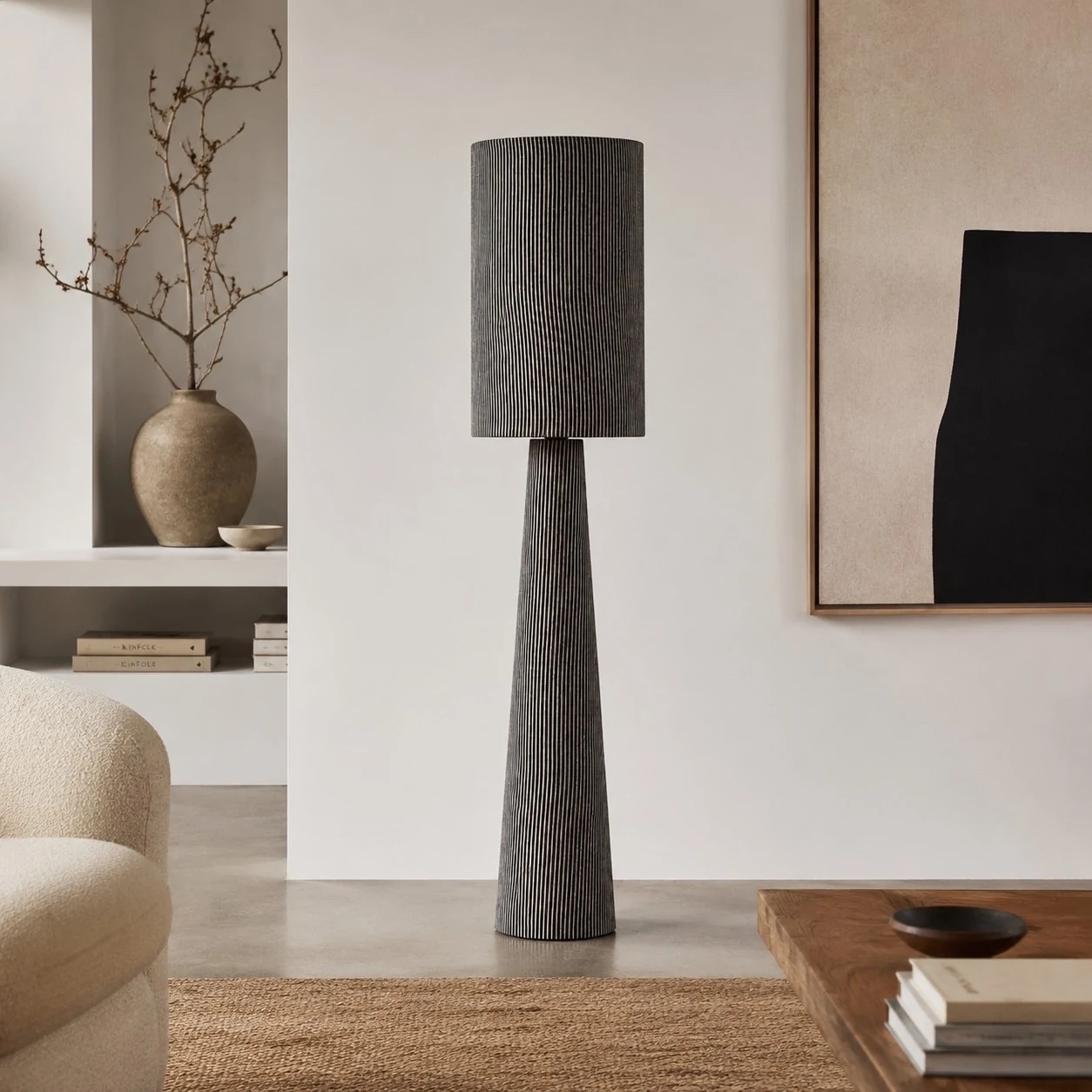 Gray striped floor lamp in a modern neutral living room