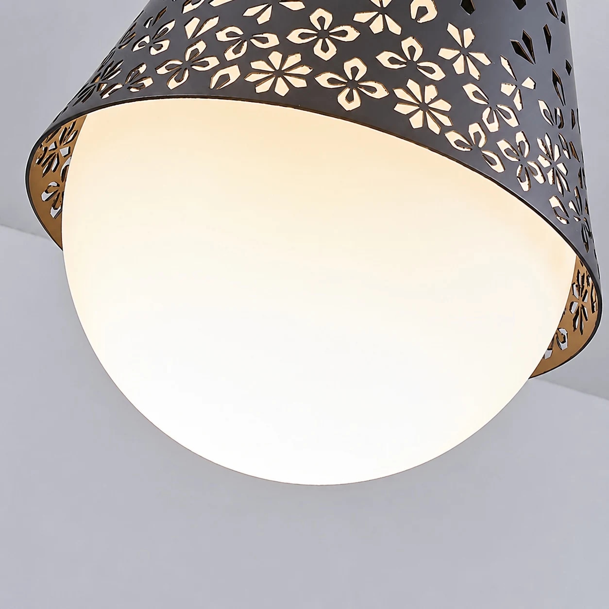 Baoxela glowing white glass diffuser and perforated metal rim detail