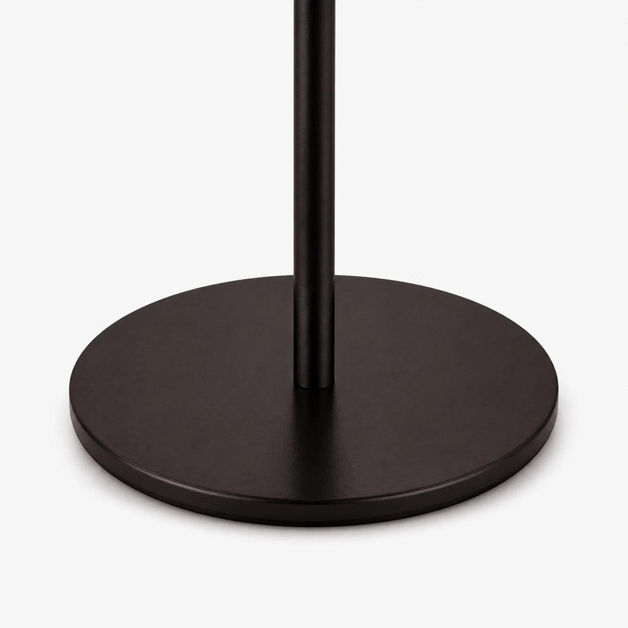 Black metal round base close view