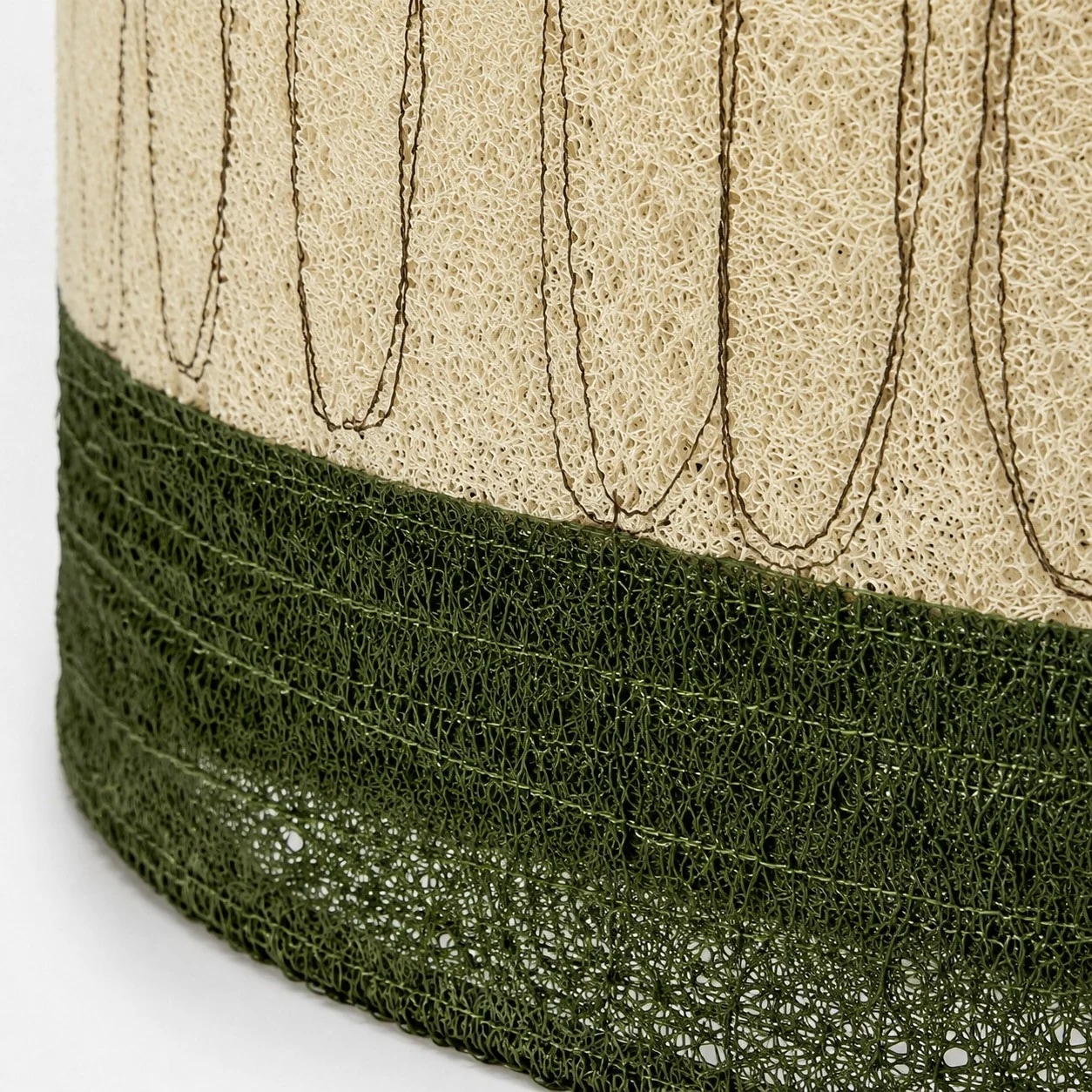 Close detail of loofah fiber and green trim