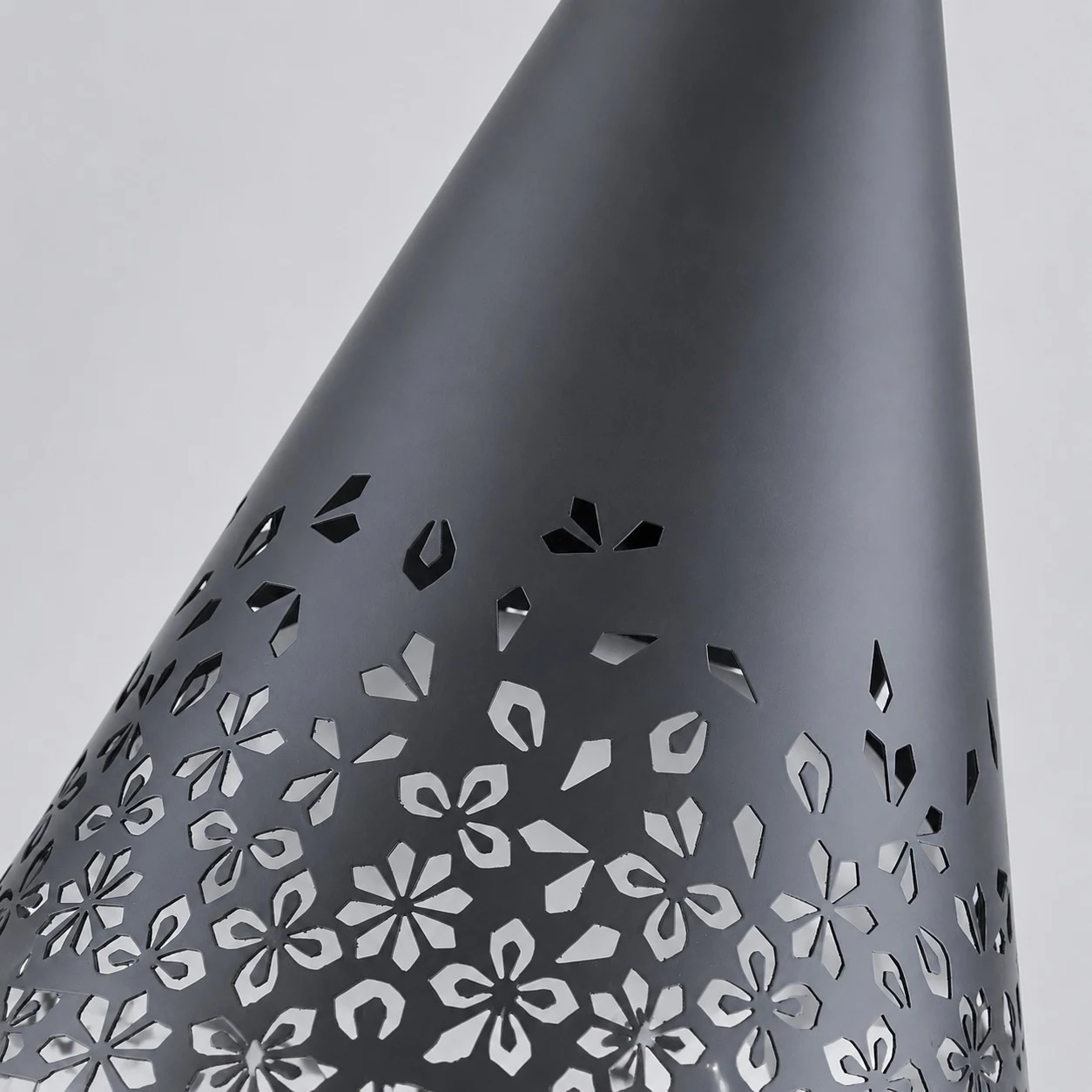 Baoxela black matte metal shade and floral cutout detail