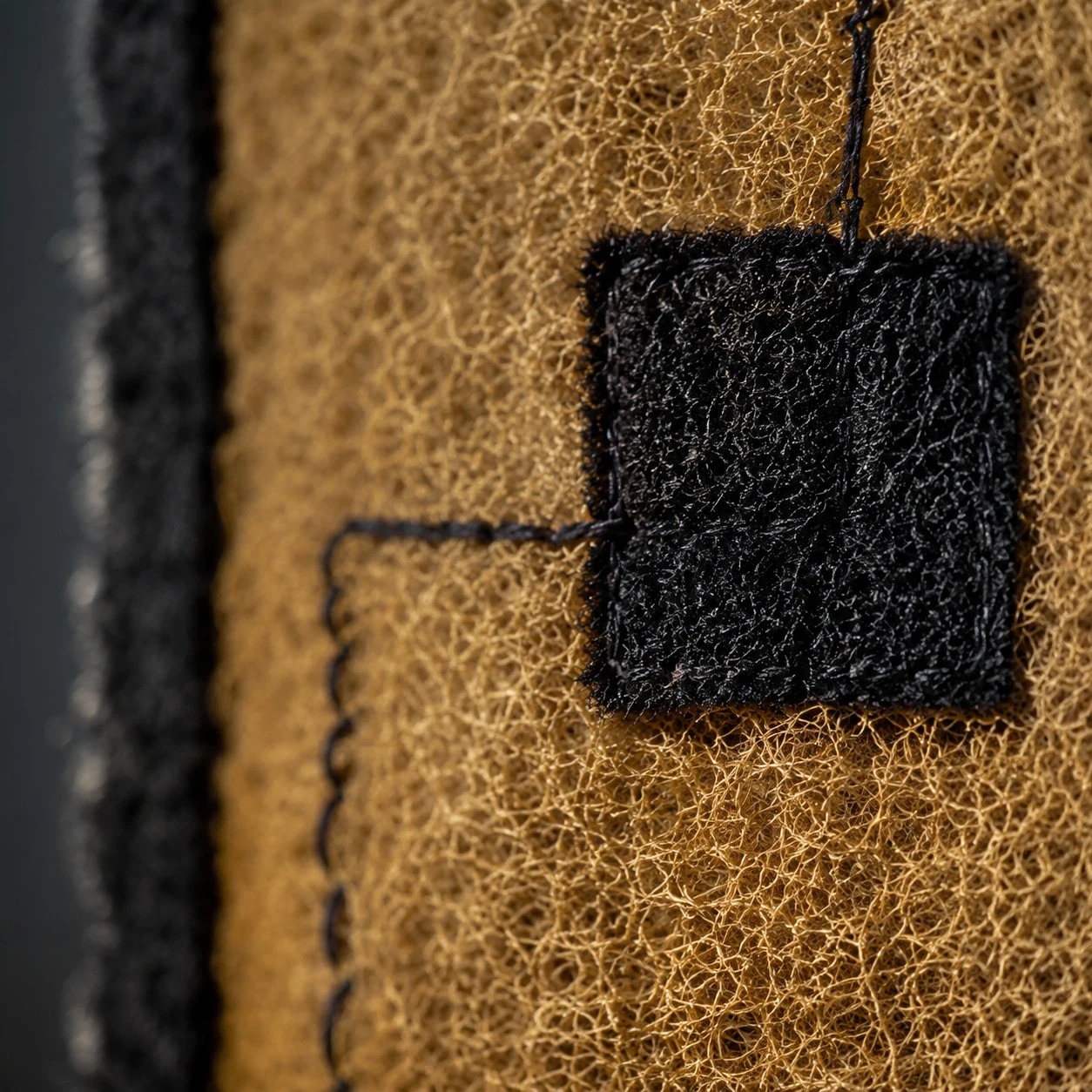 Close view of woven shade patch detail